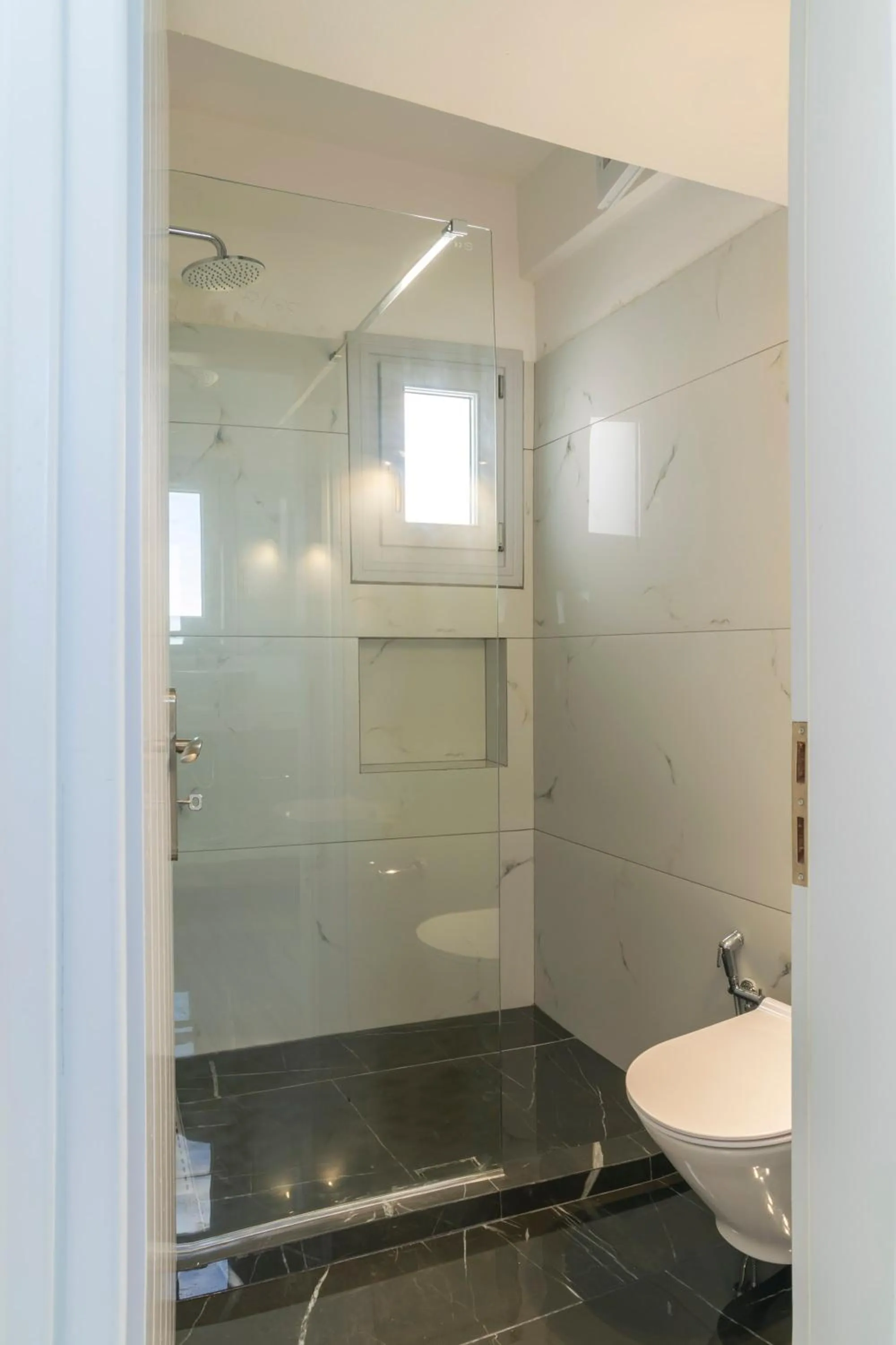 Bathroom in Phaos Santorini Suites