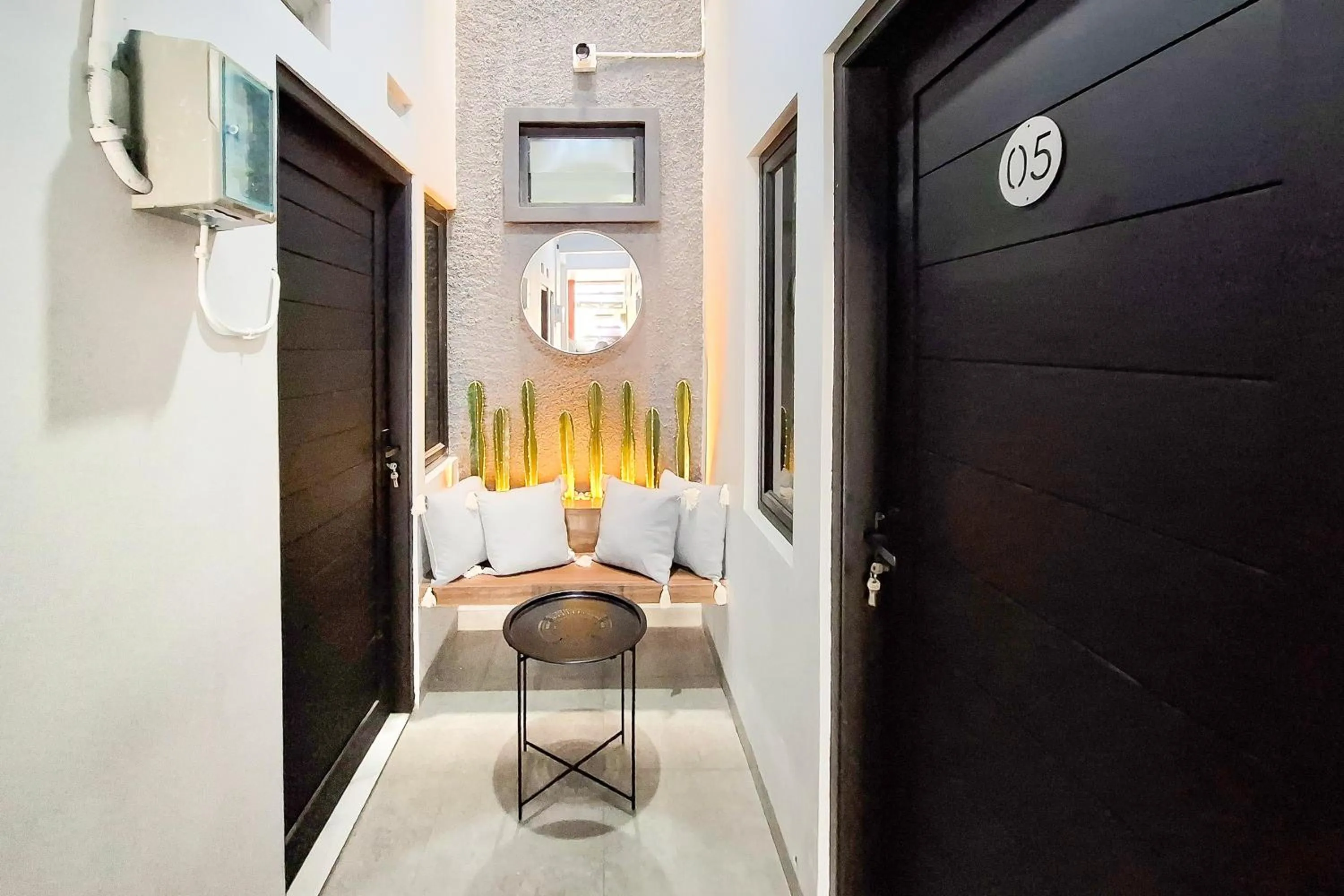 Seating area in Urbanview Hotel Syariah Terra House Pati by RedDoorz