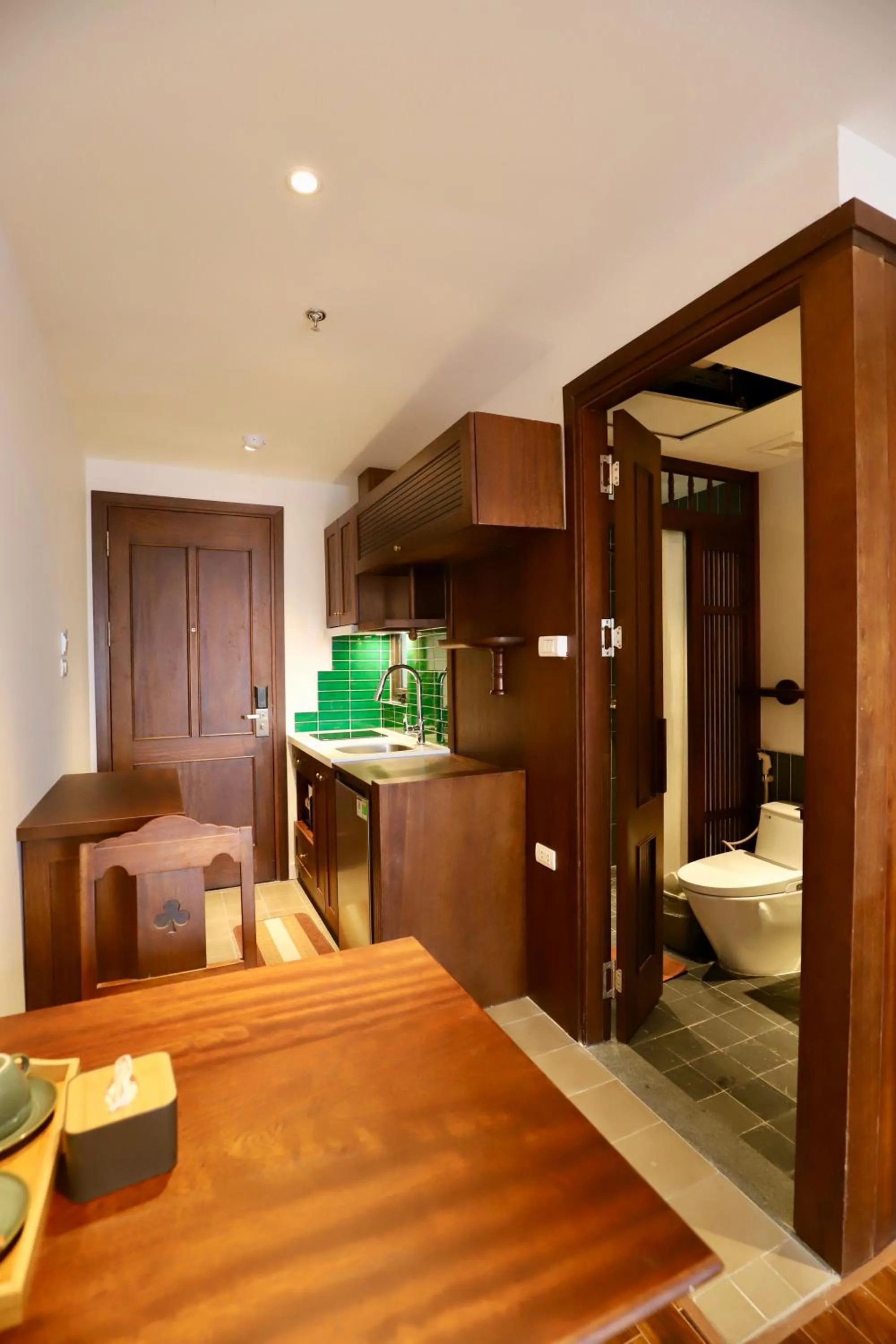 Kitchen or kitchenette, Bed in Maison Nha 16 Nguyen Khuyen