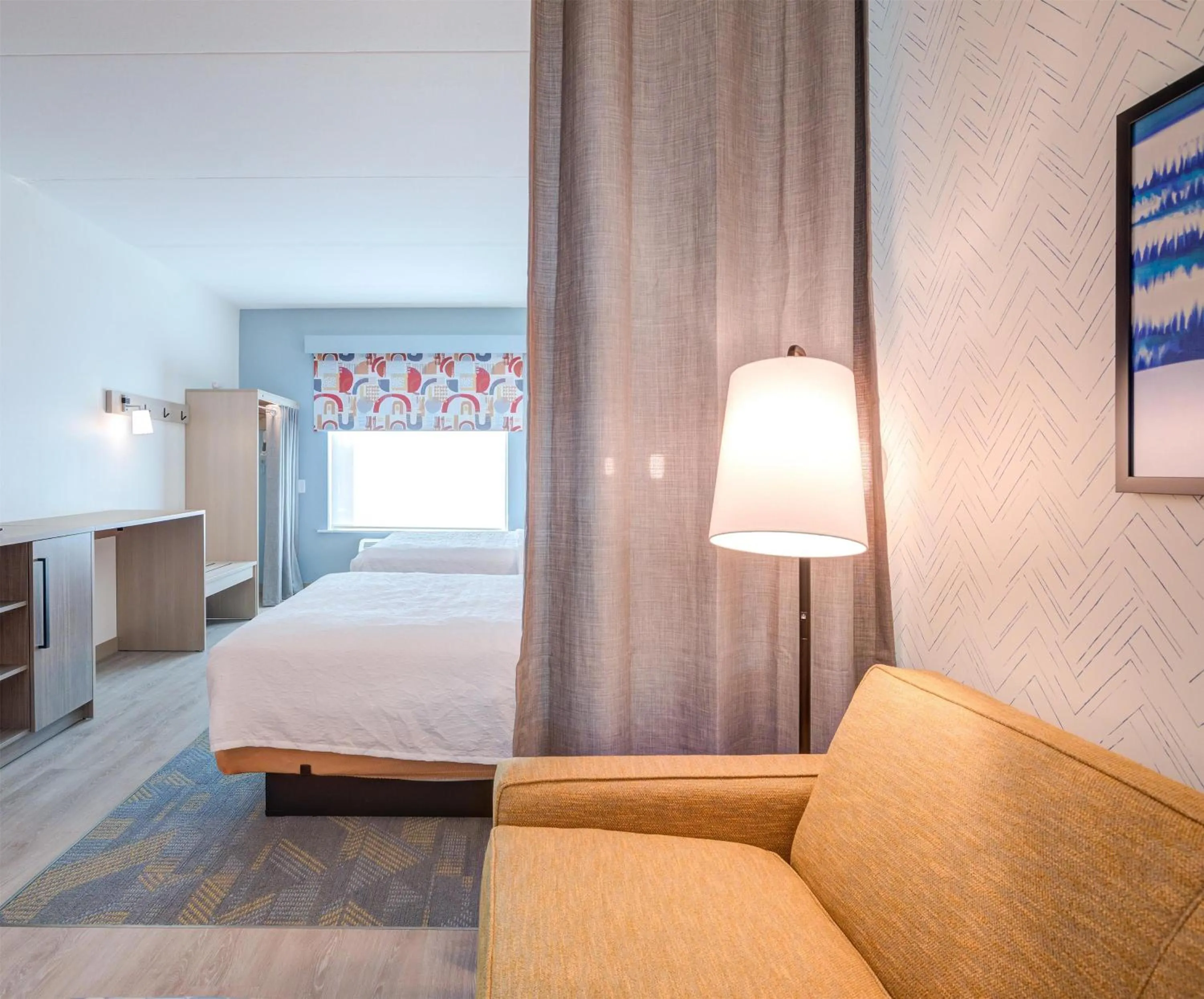 Living room, Bed in Home2 Suites By Hilton Smithfield Selma