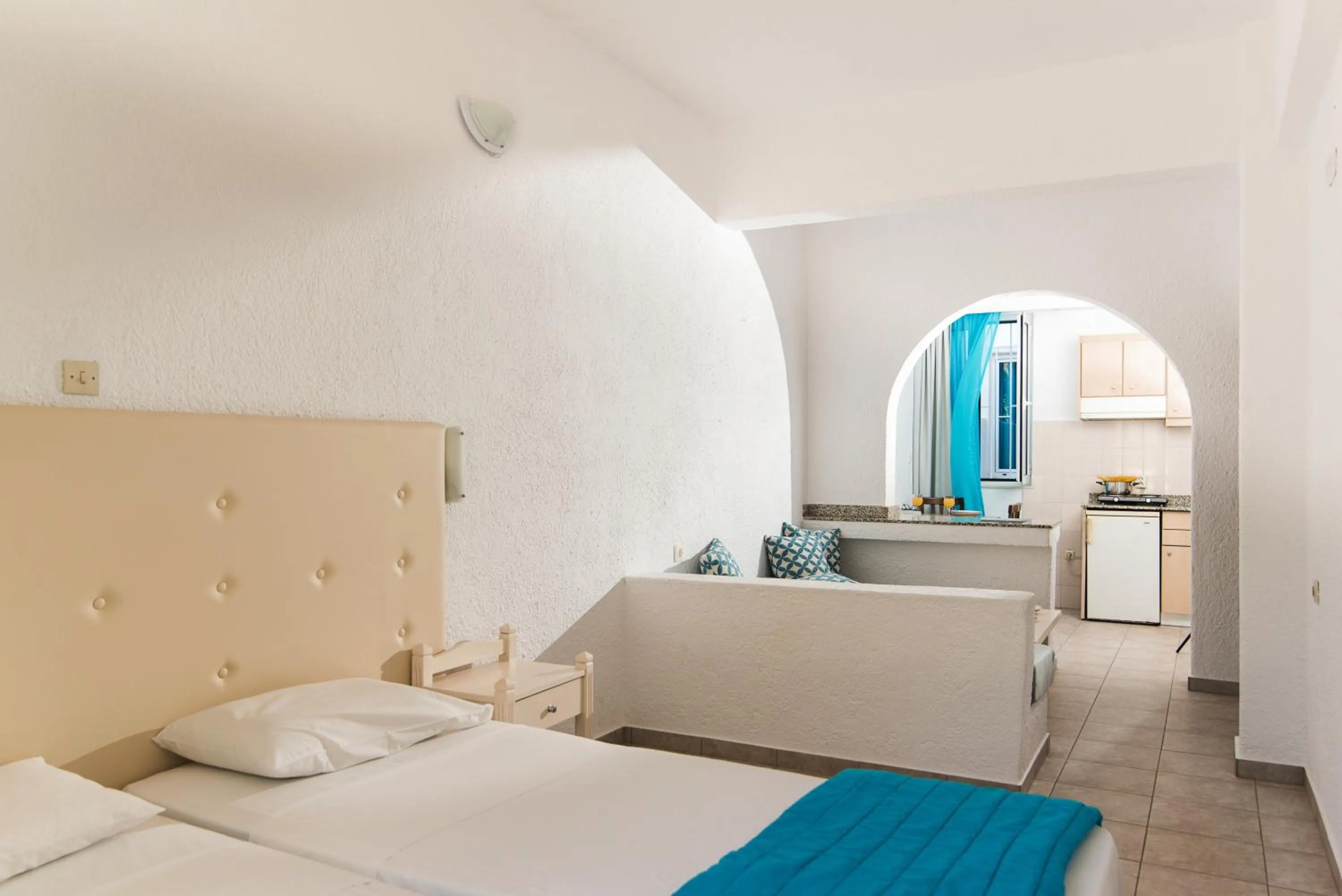Kitchen or kitchenette, Bed in Ibiscus Hotel Malia