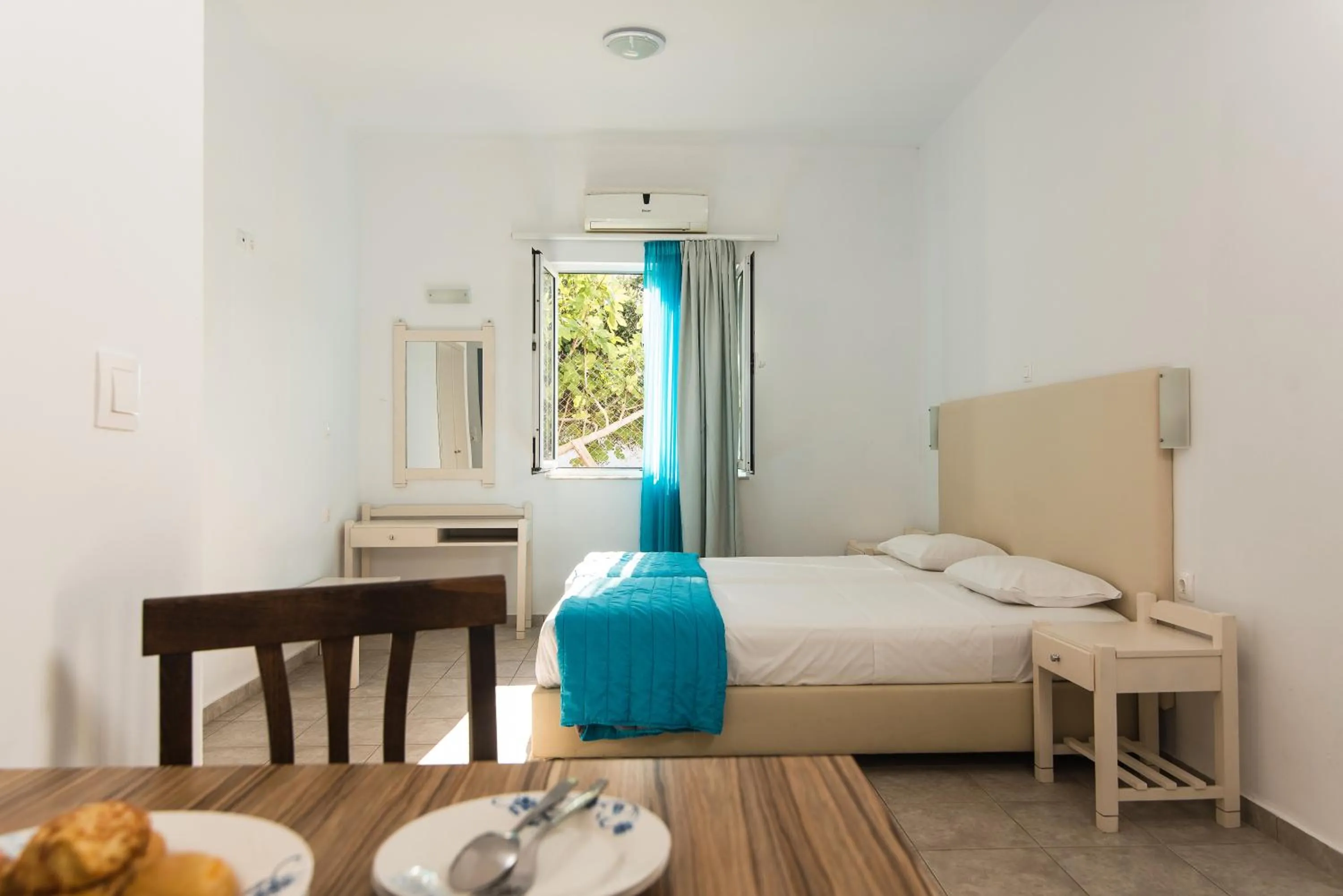 Dining area, Bed in Ibiscus Hotel Malia