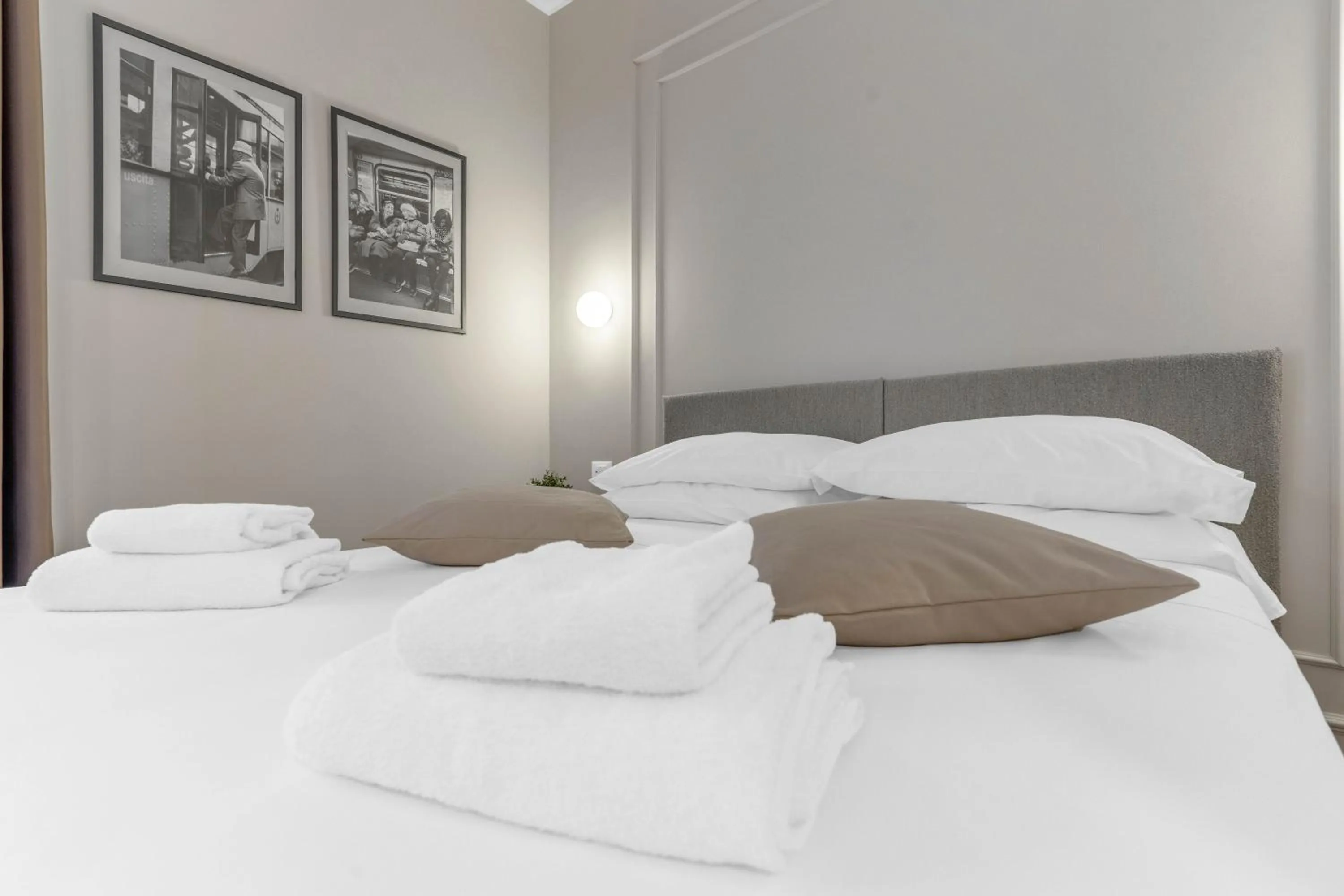 Bed in Torriani Suites Foresteria Lombarda