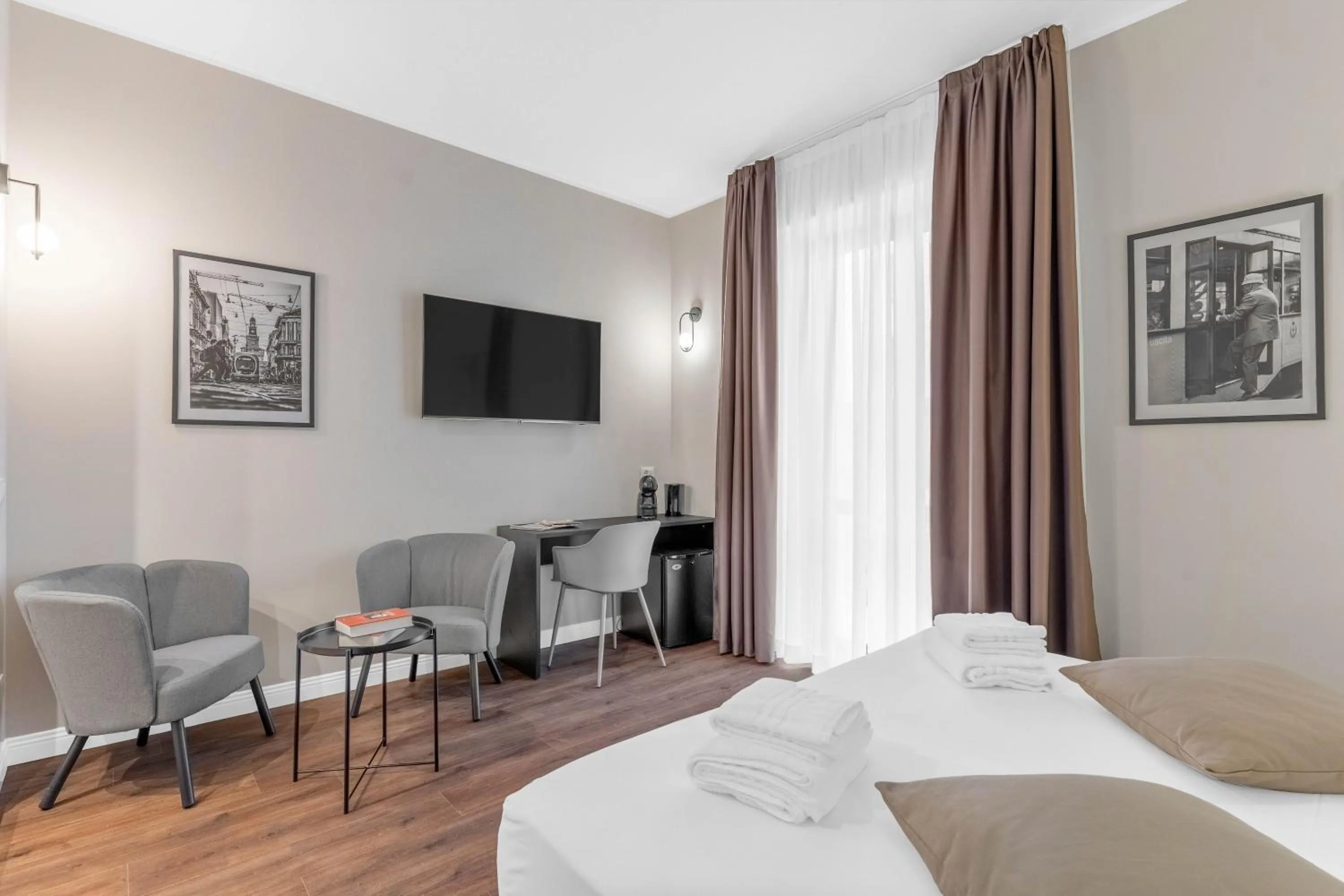Bed in Torriani Suites Foresteria Lombarda