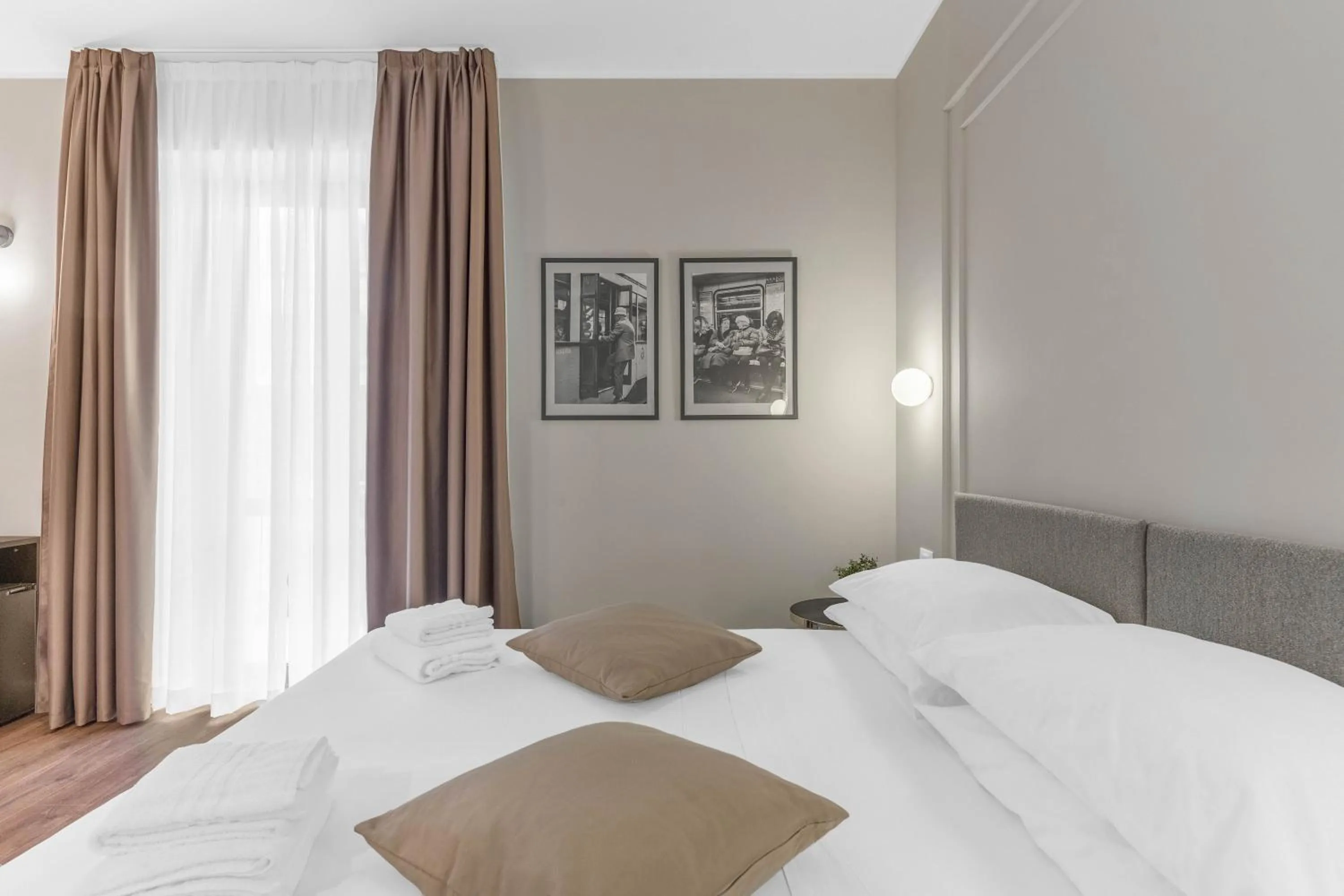 Bed in Torriani Suites Foresteria Lombarda