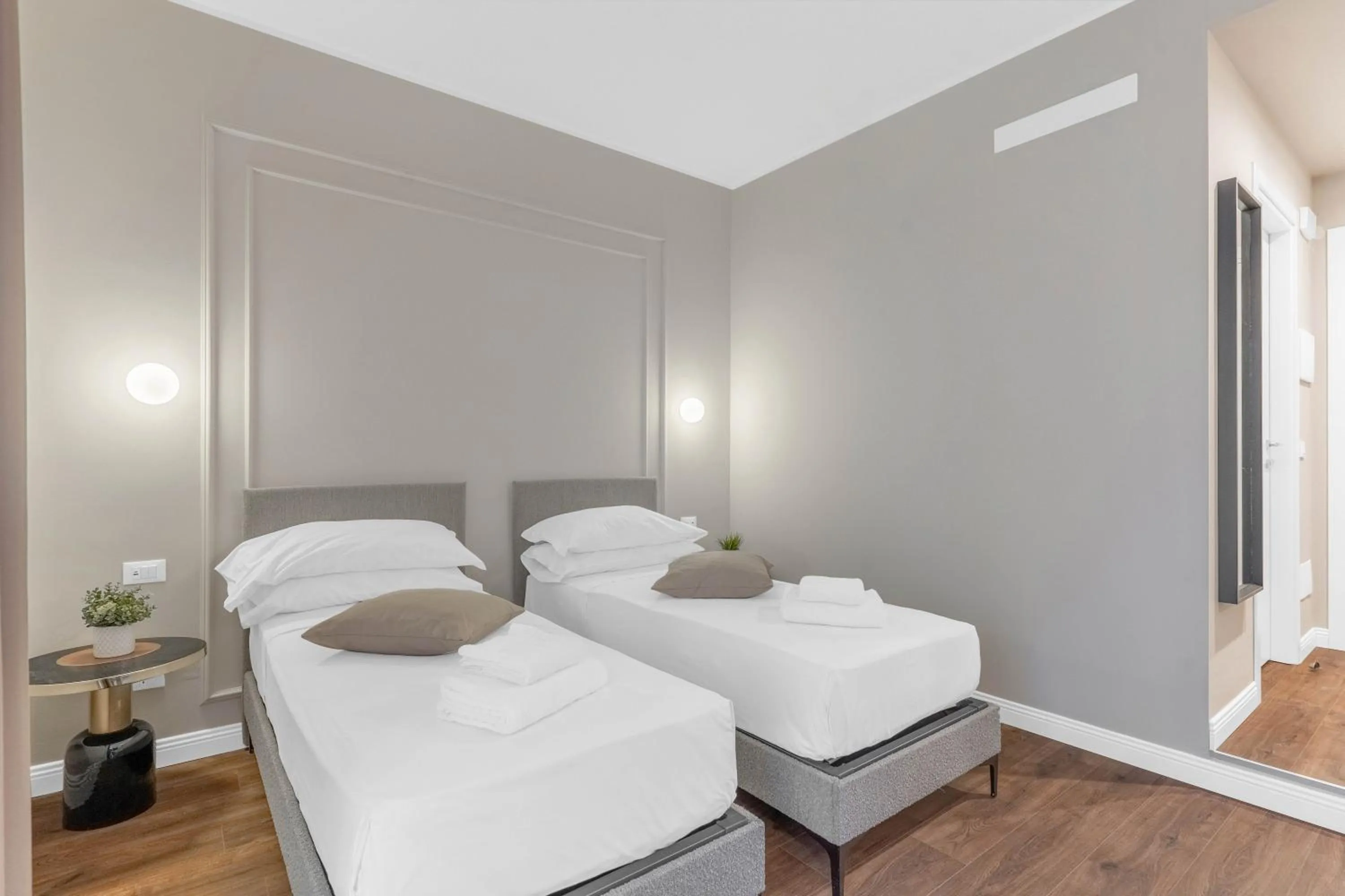 Bed in Torriani Suites Foresteria Lombarda