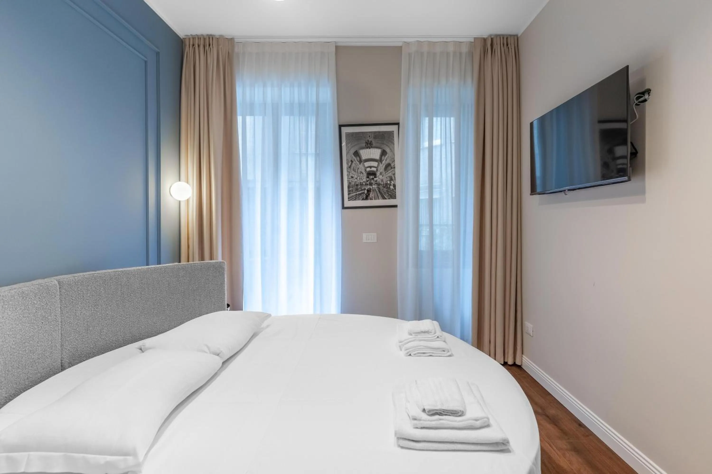 Bed in Torriani Suites Foresteria Lombarda