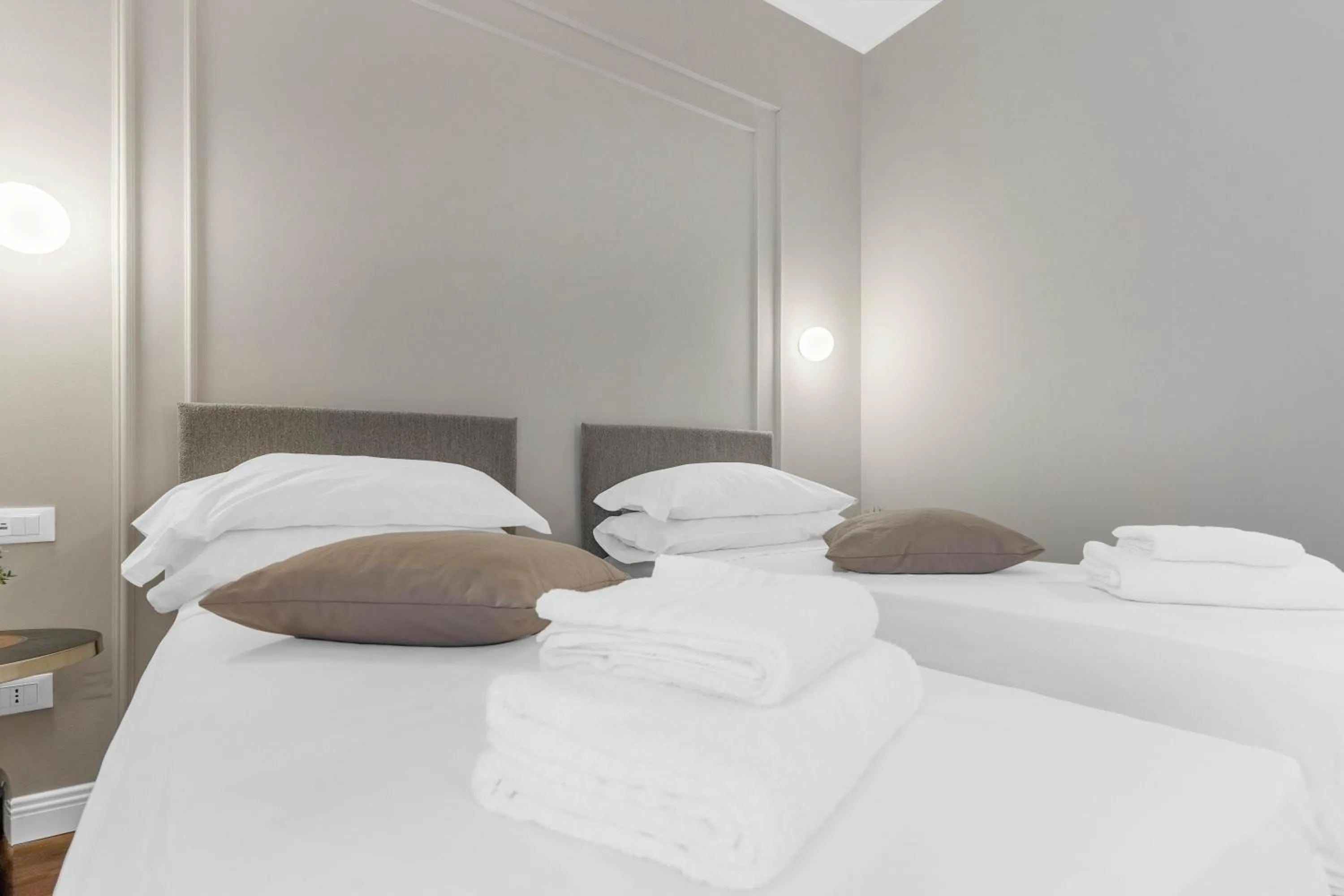 Bed in Torriani Suites Foresteria Lombarda