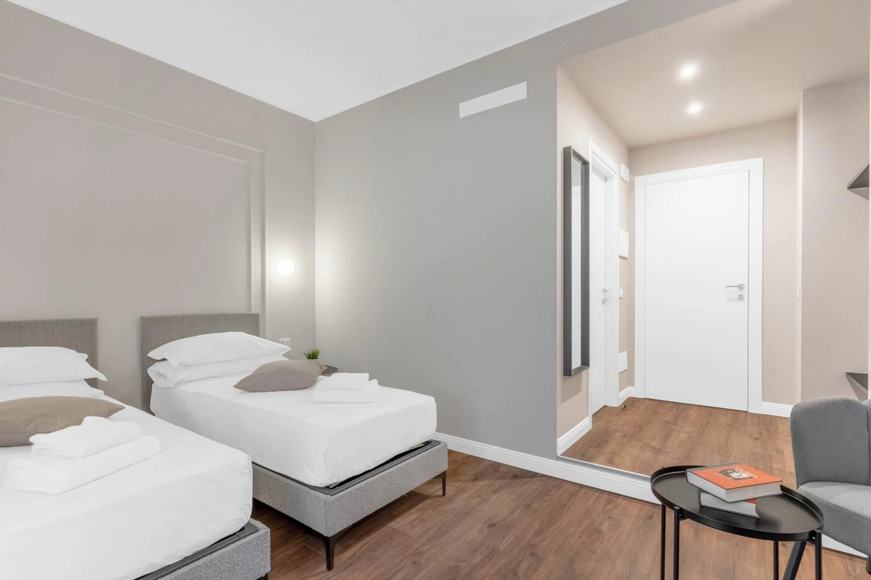 Bed in Torriani Suites Foresteria Lombarda