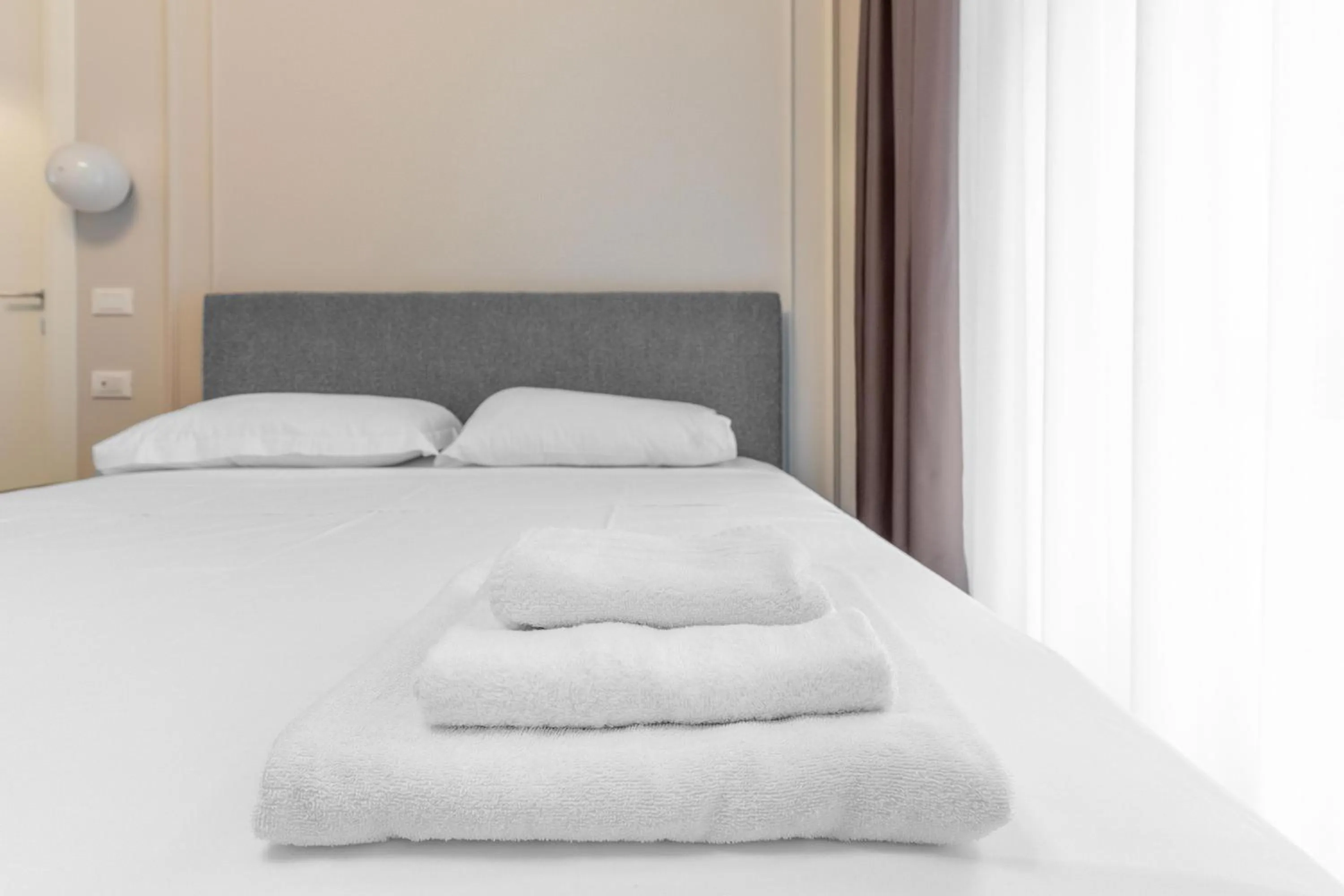 Bed in Torriani Suites Foresteria Lombarda
