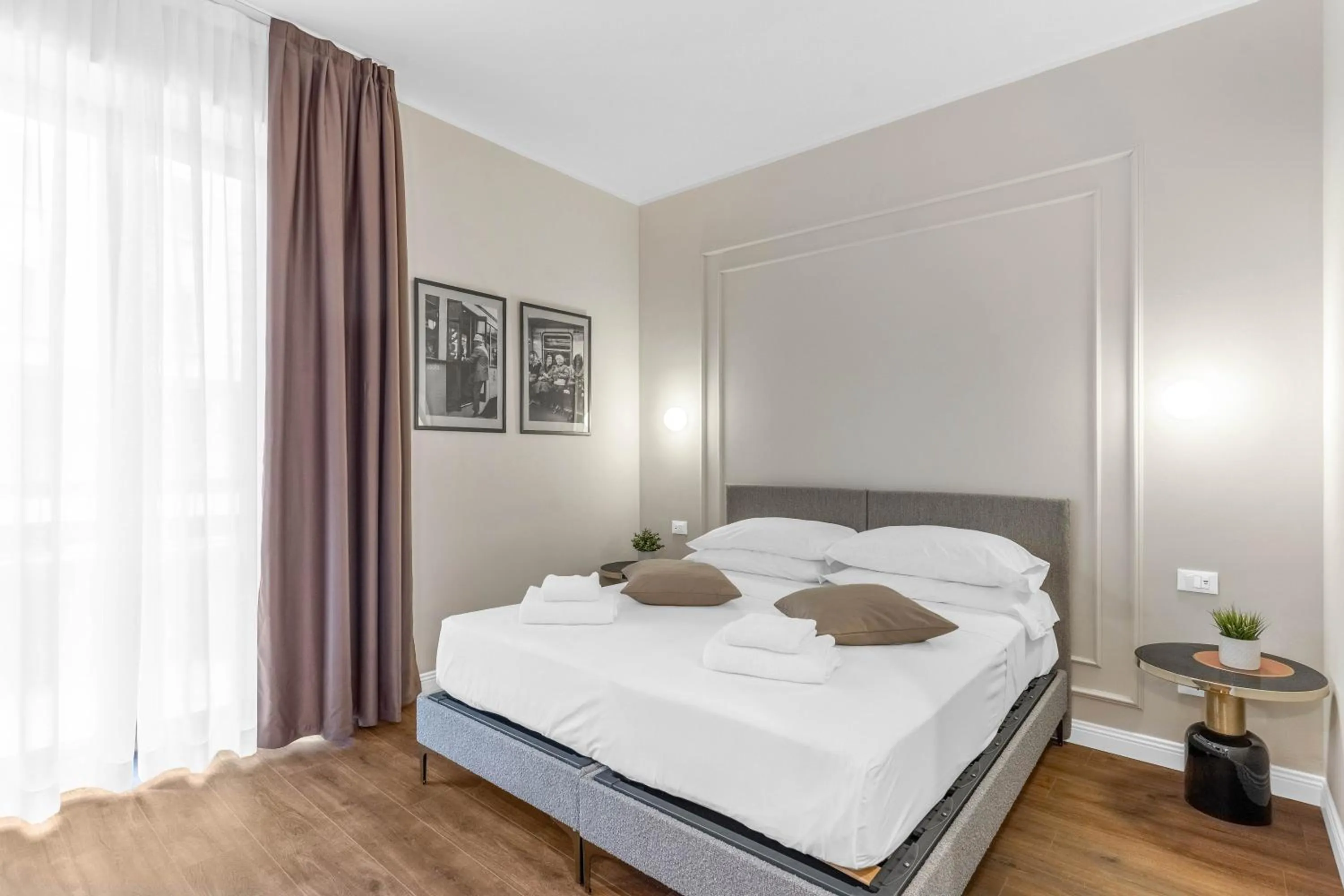 Bed in Torriani Suites Foresteria Lombarda