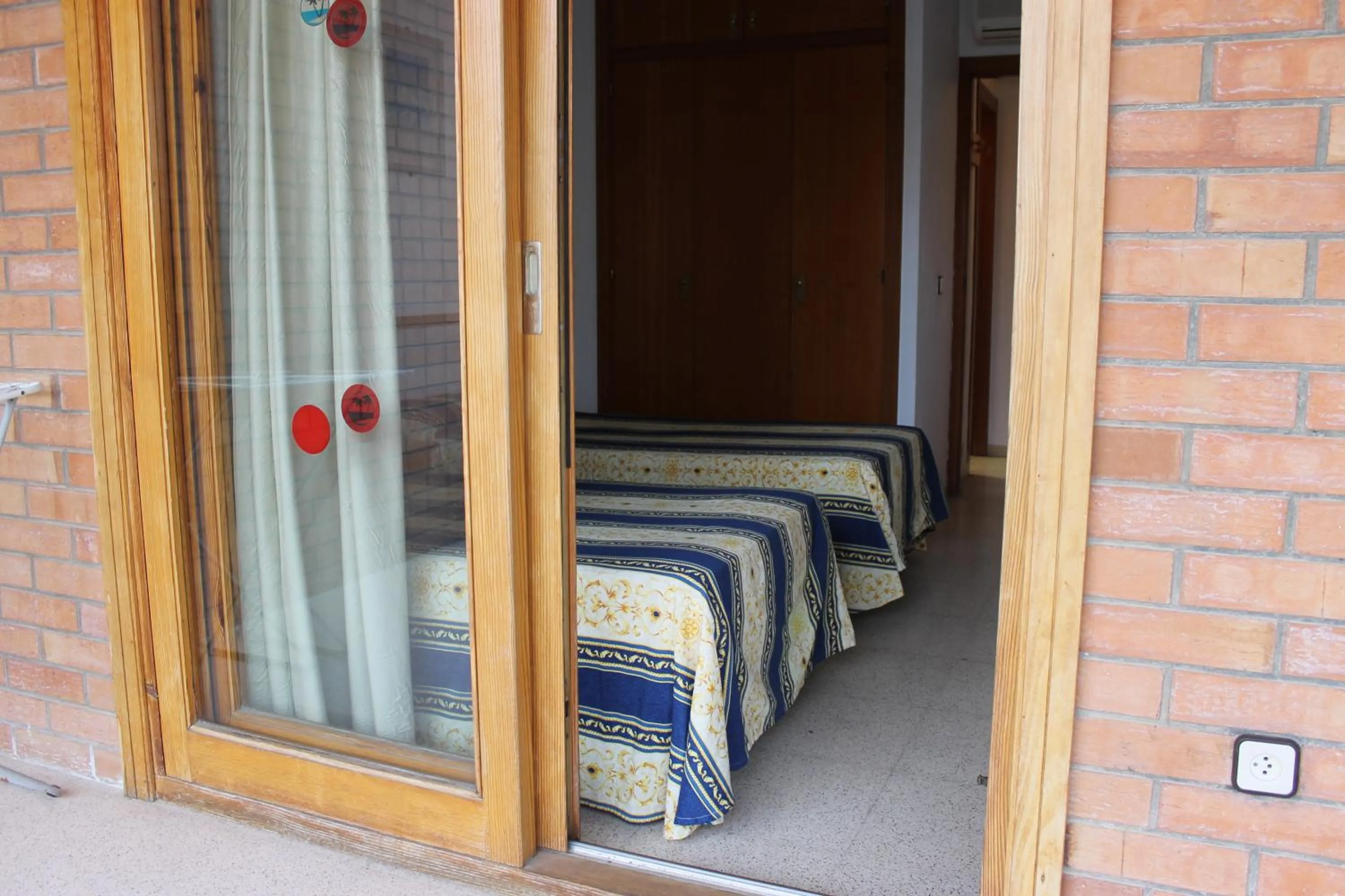 Bed in Apartamentos Alpha