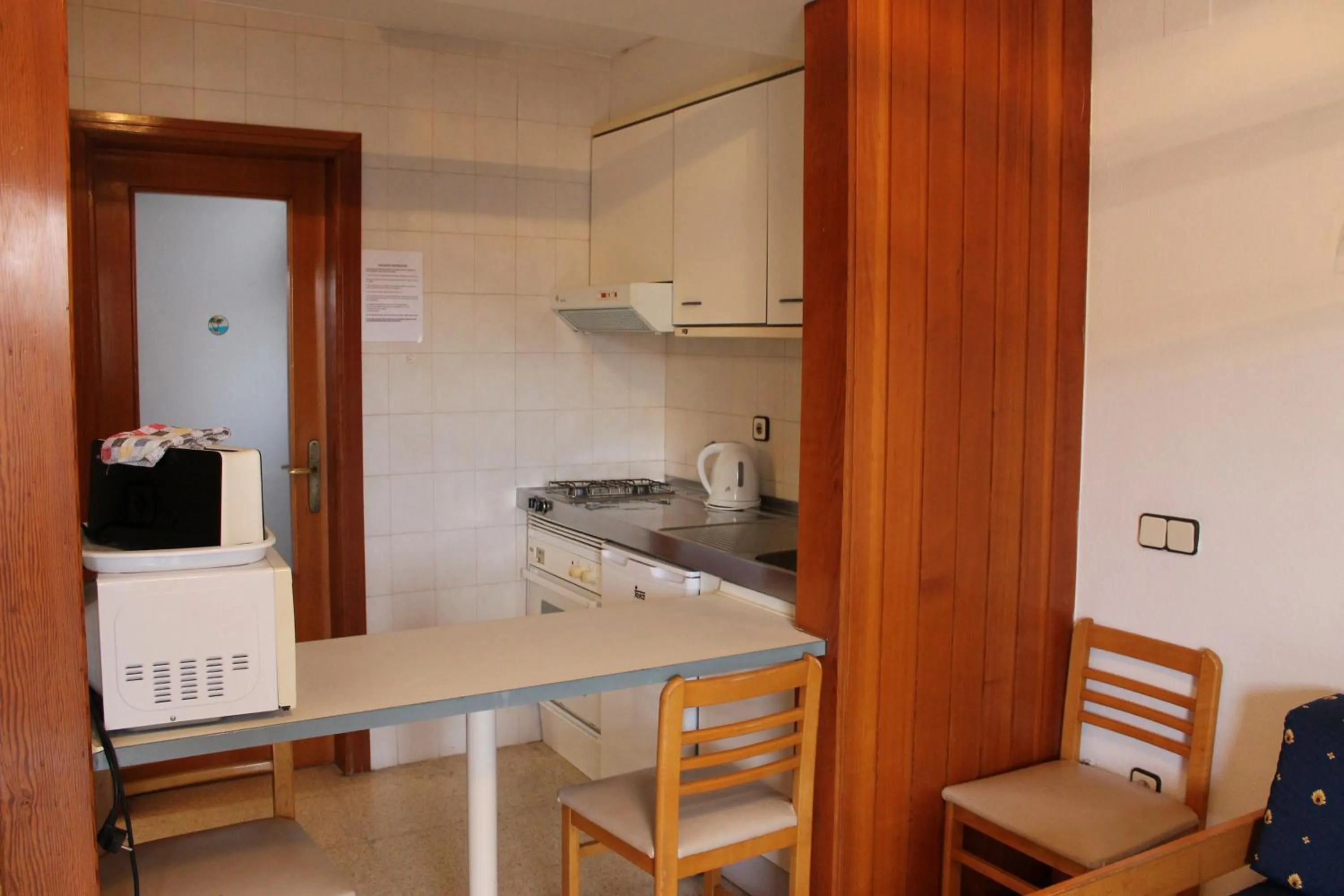 Kitchen or kitchenette in Apartamentos Alpha