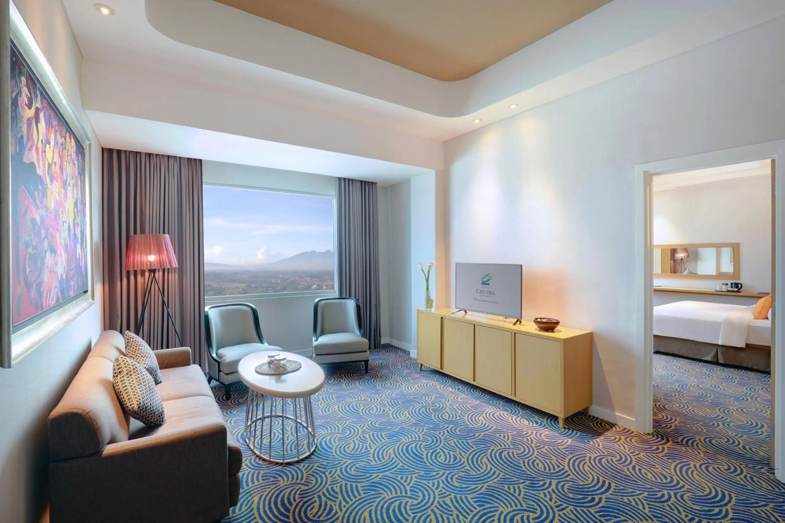 Living room, Bed in Hotel Ciputra Cibubur managed by Swiss-Belhotel International