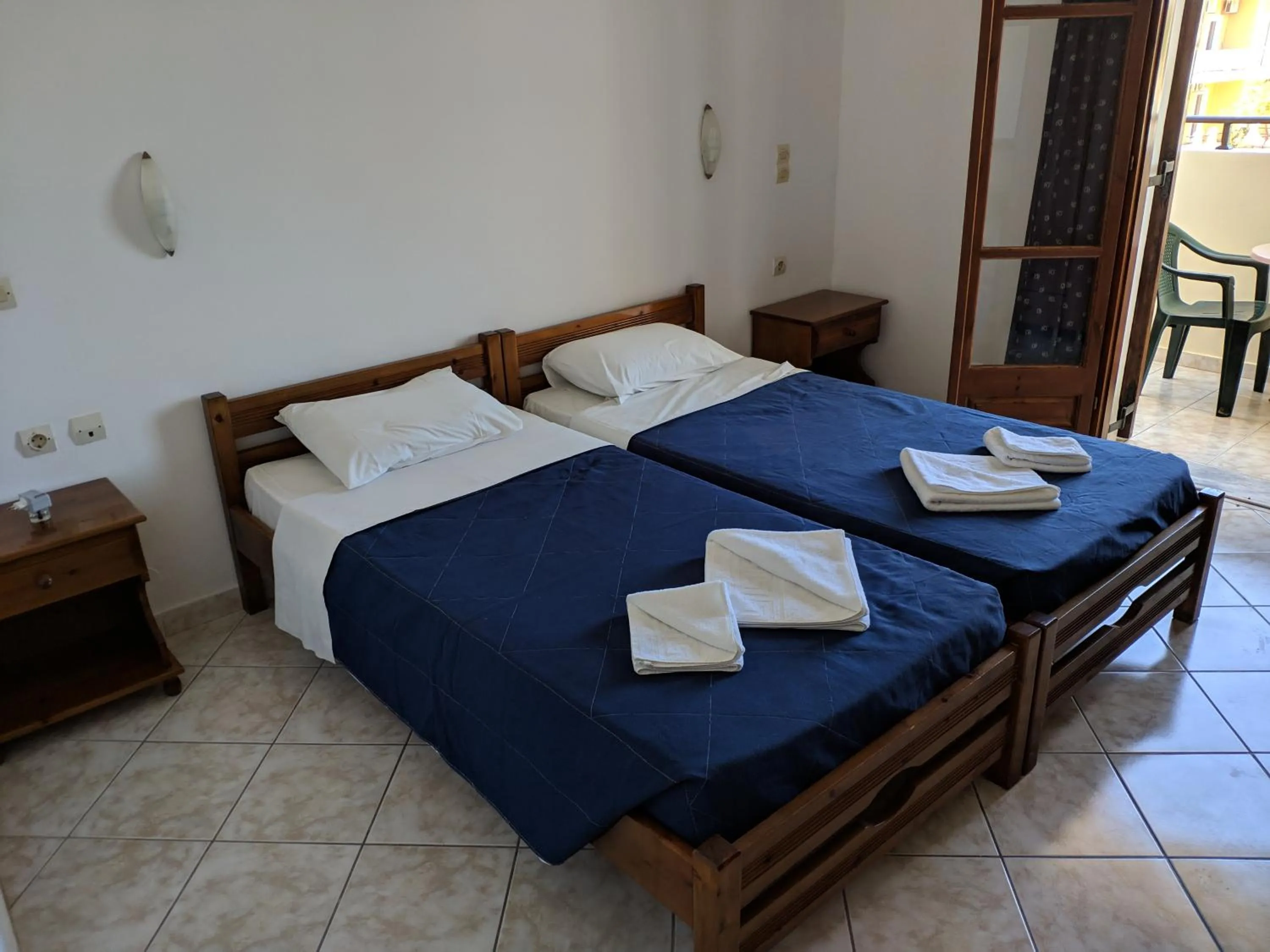 Bed in Tondoris Apartments