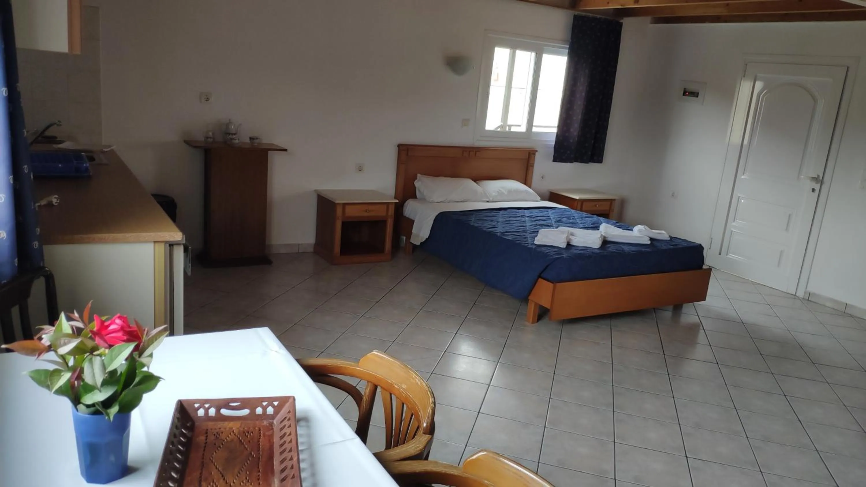 Bed in Tondoris Apartments