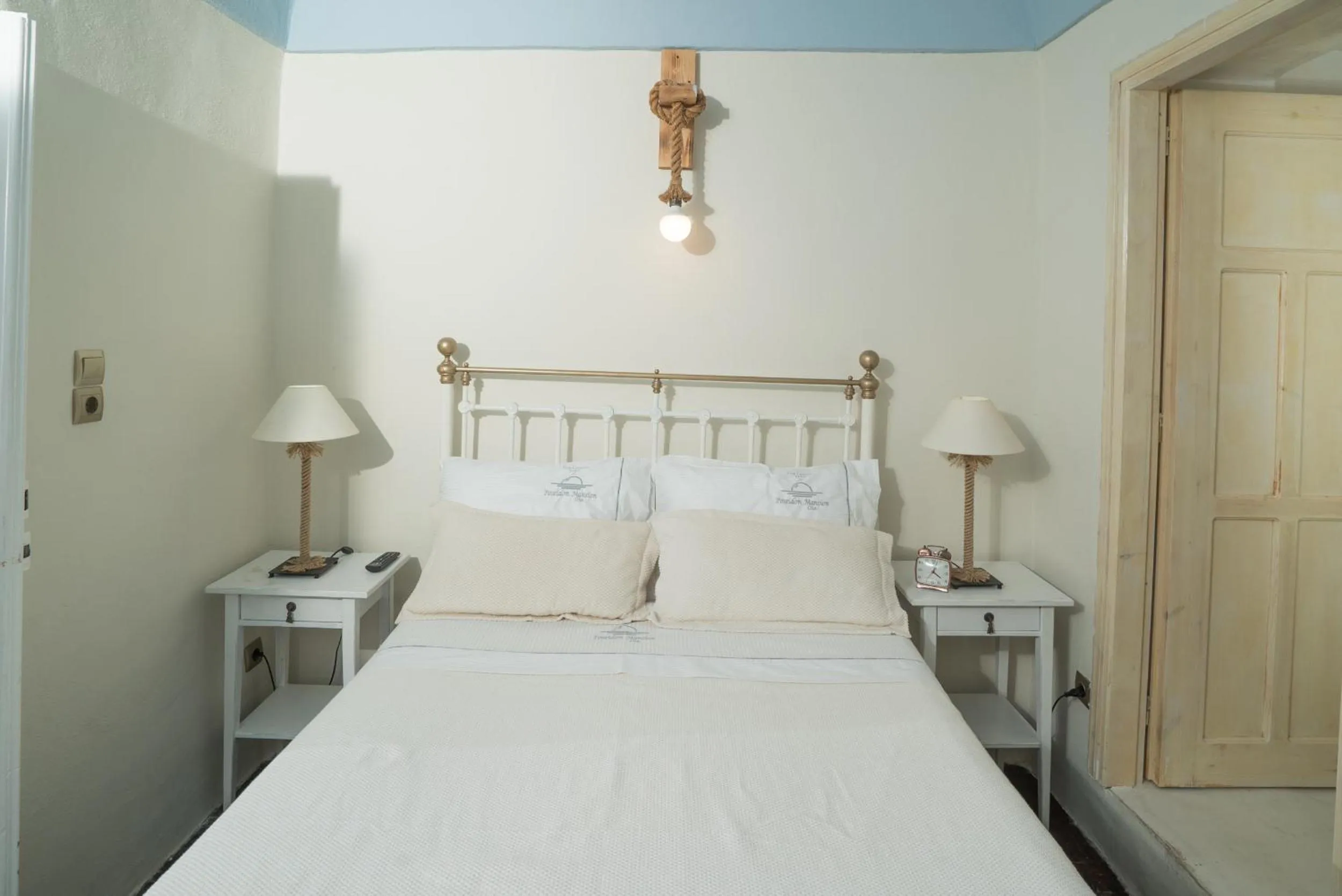 Bed in Poseidon Mansion Sunset