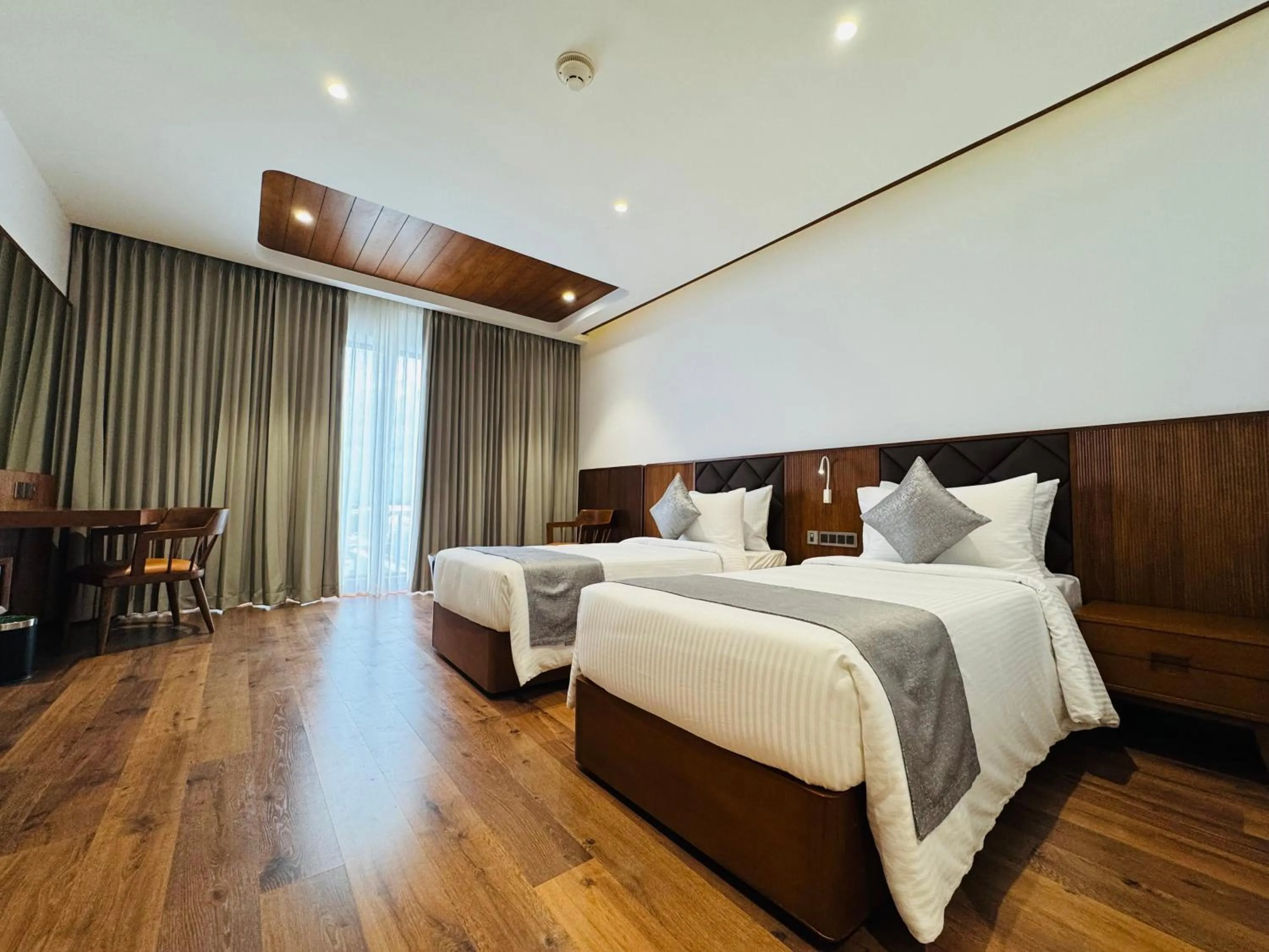 Bed in Gokulam Grand Kozhikode