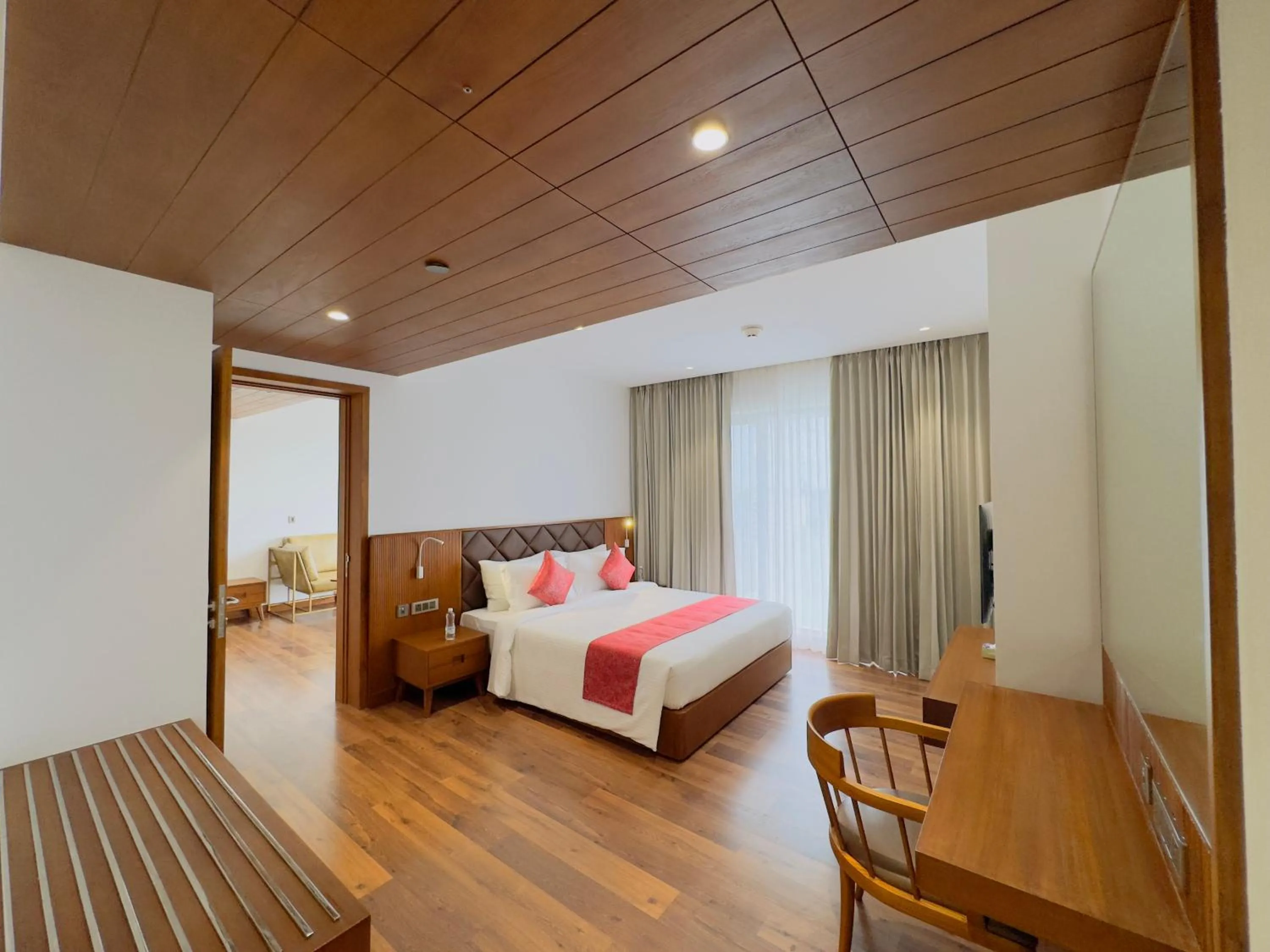 Bedroom, Bed in Gokulam Grand Kozhikode