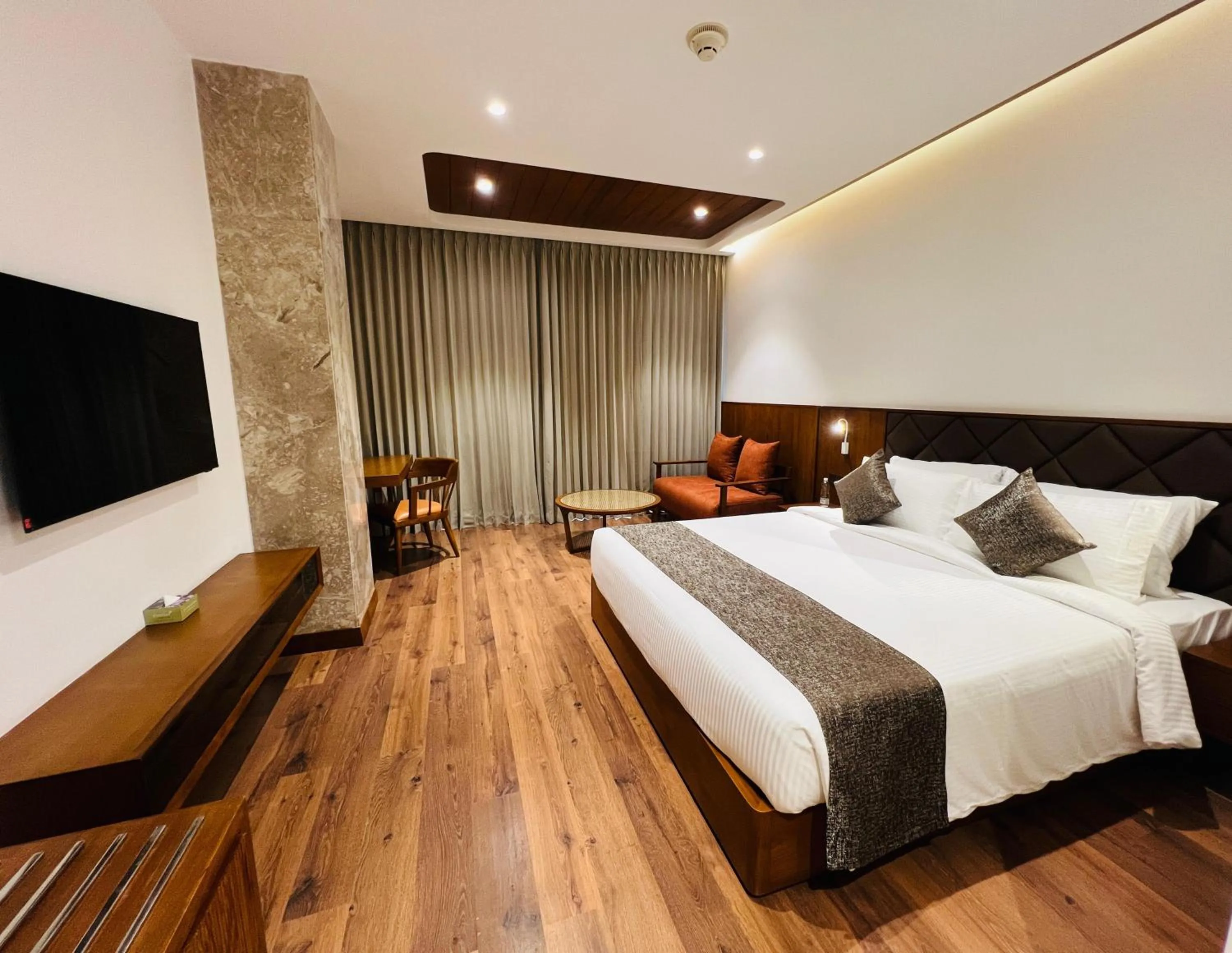 Bed in Gokulam Grand Kozhikode