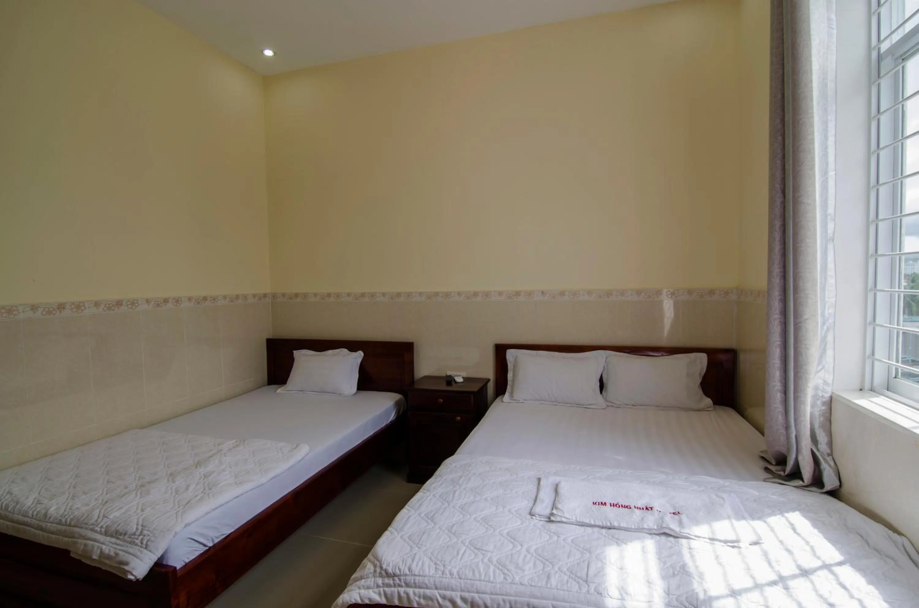 Bed in Kim Hồng Nhật Guest House