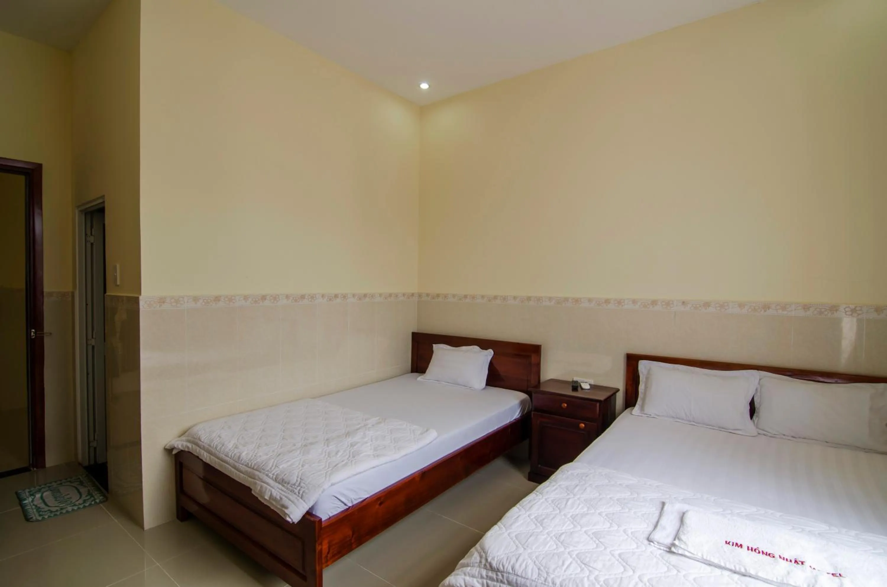 Bed in Kim Hồng Nhật Guest House