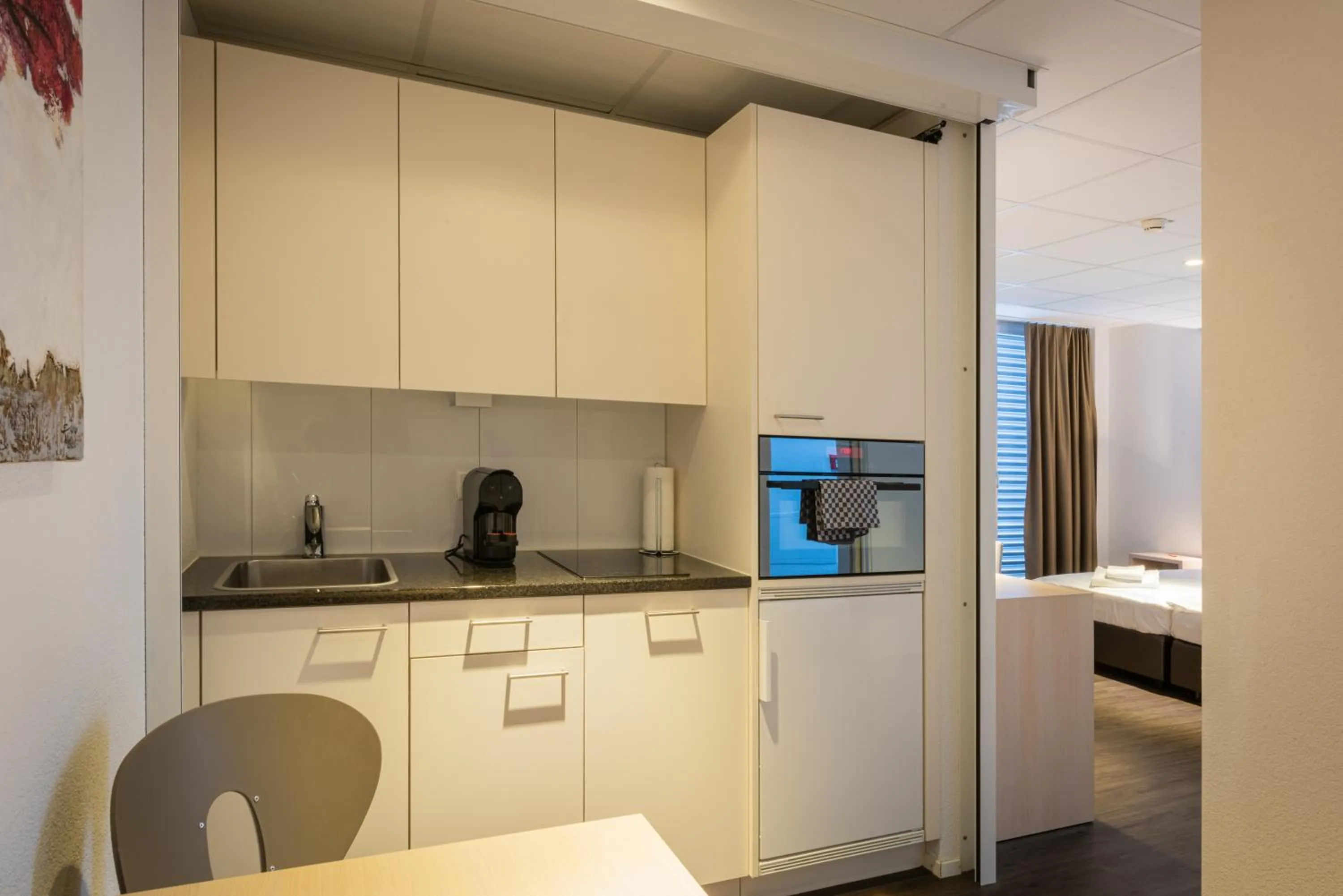 Kitchen or kitchenette in Los Lorentes Hotel Bern Airport
