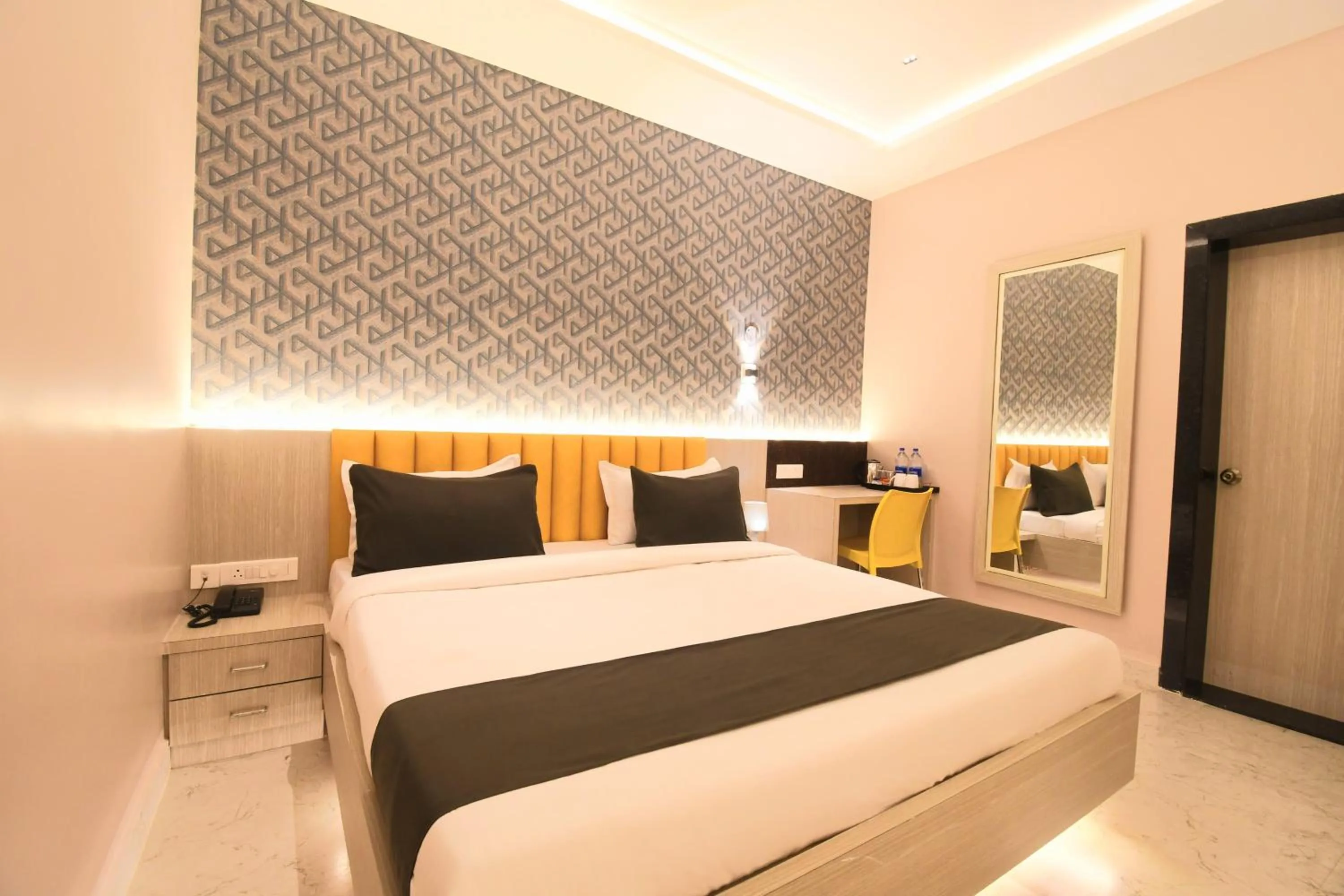 Bed in Hotel Sai Swastik