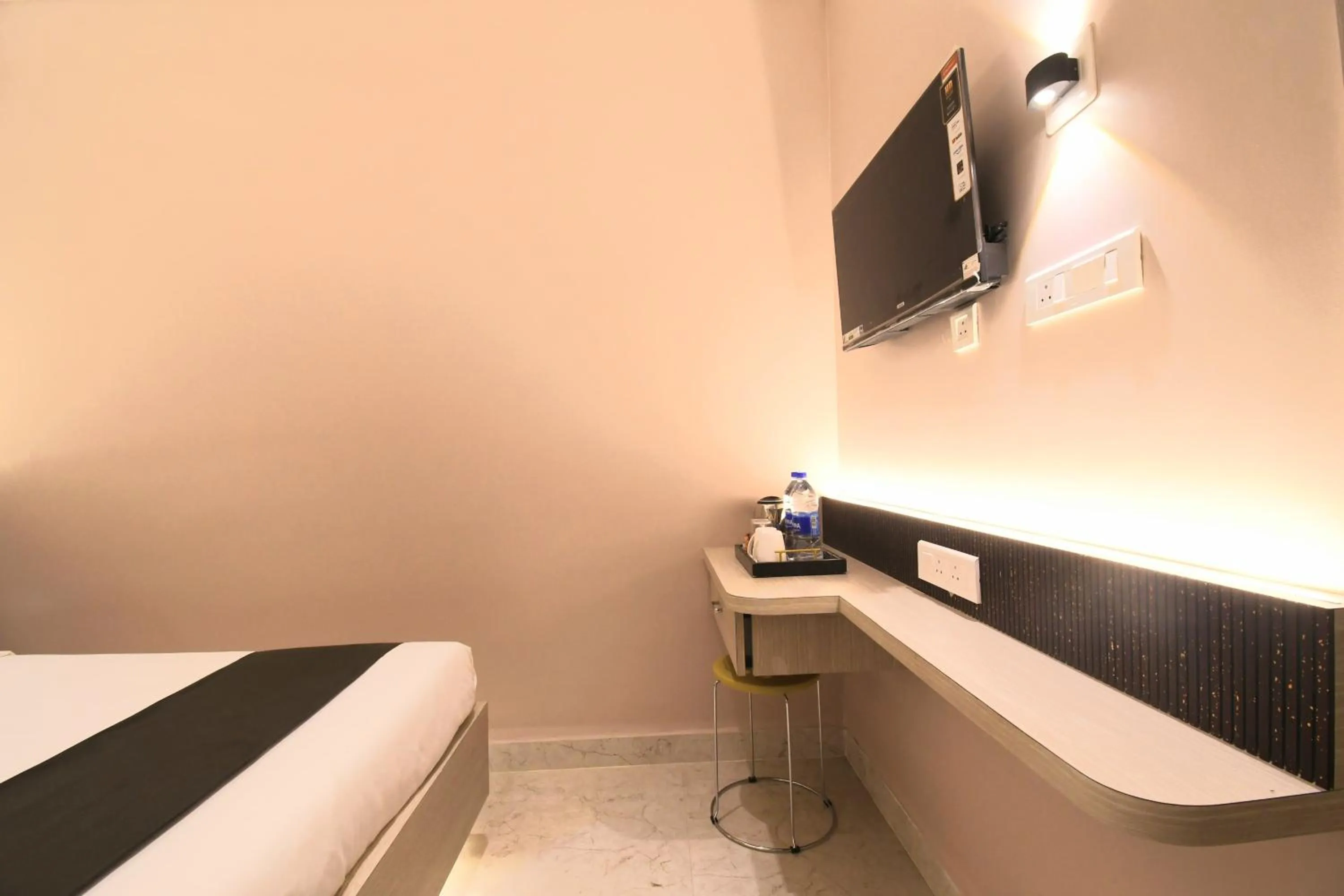 Bed in Hotel Sai Swastik