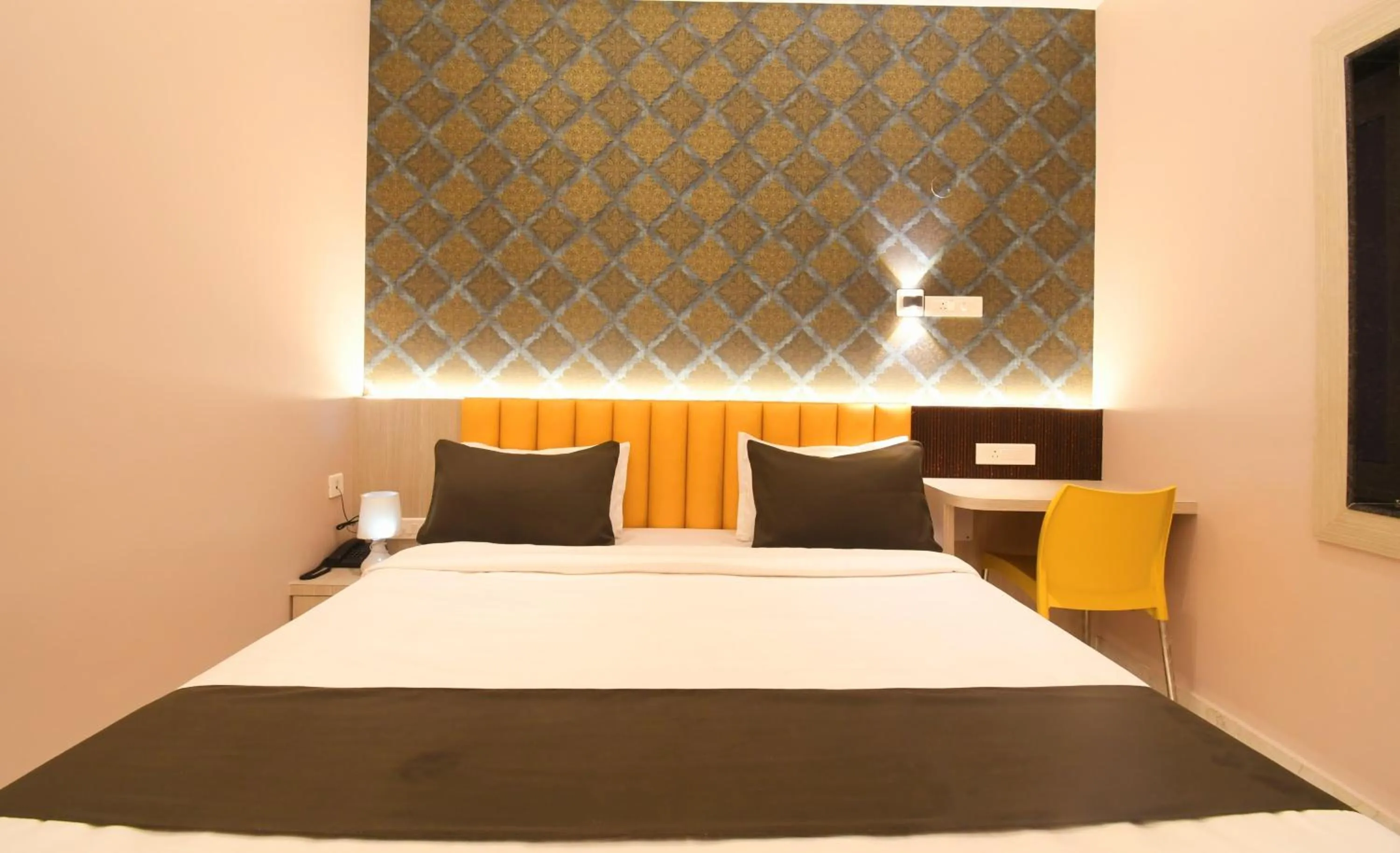 Bed in Hotel Sai Swastik
