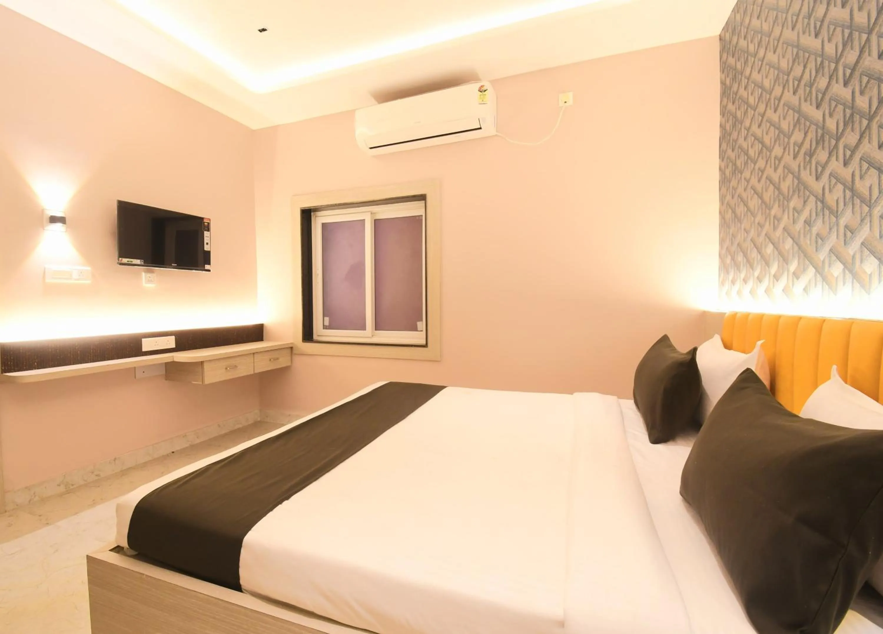 Bed in Hotel Sai Swastik