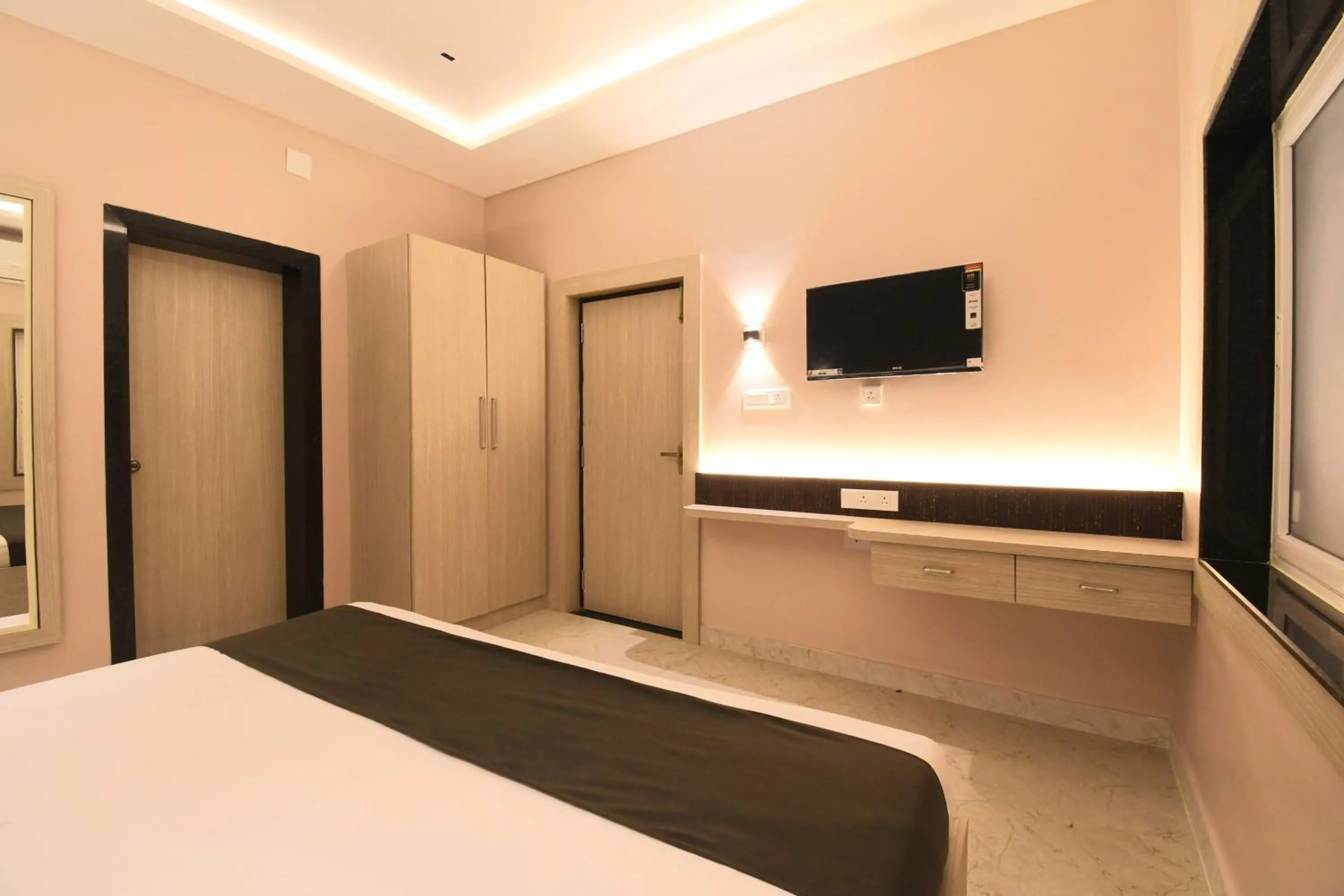 Bed in Hotel Sai Swastik