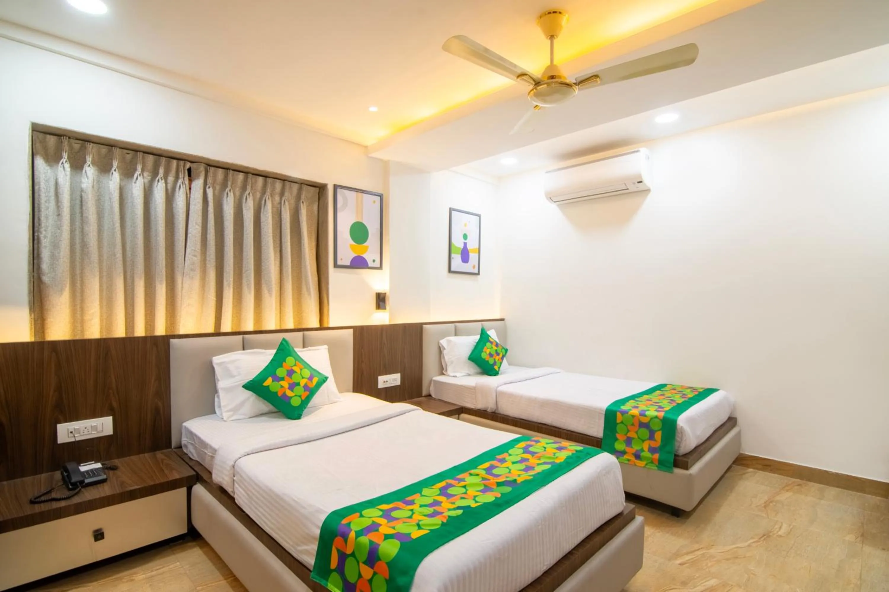 Bedroom, Bed in Treebo Petals Suites & Banquet - New Town