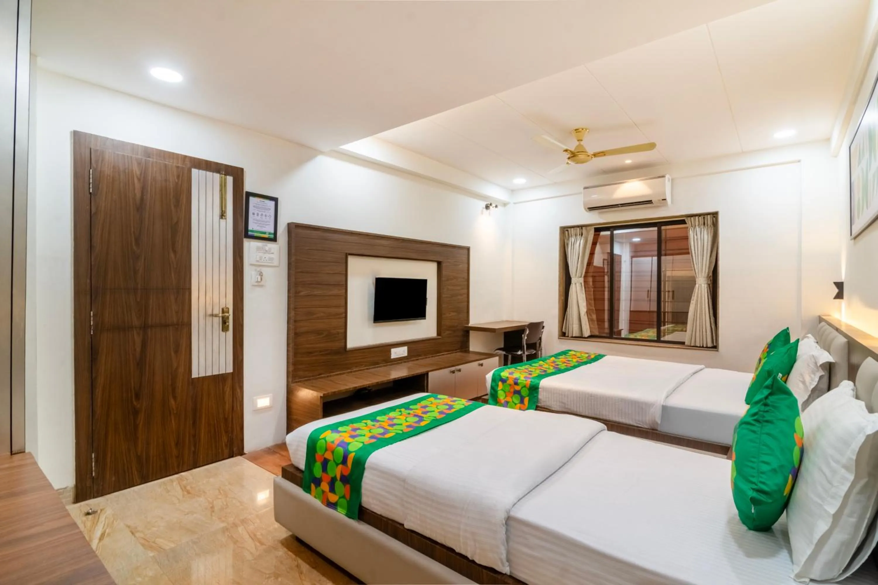 Bedroom, Bed in Treebo Petals Suites & Banquet - New Town