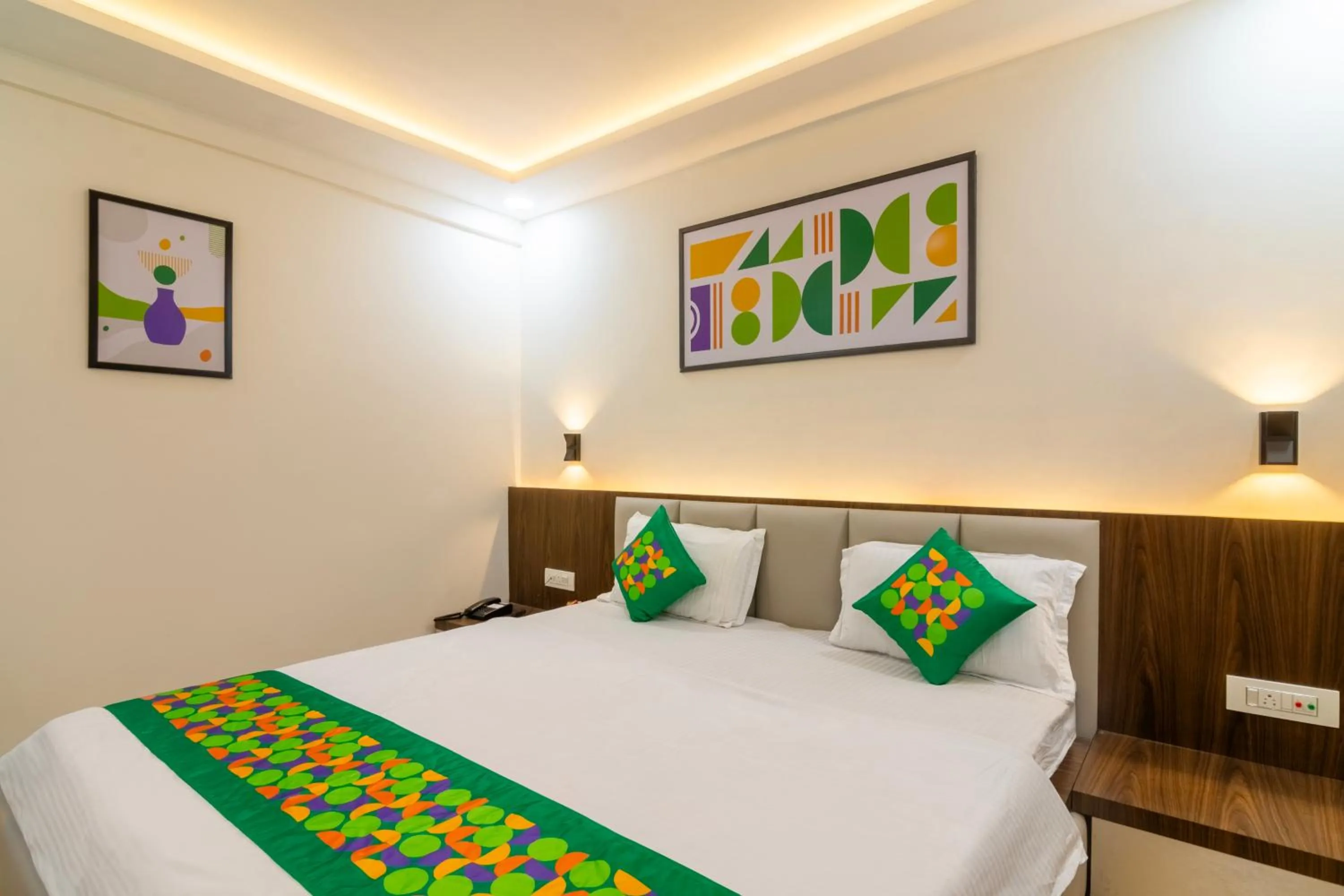 Bedroom, Bed in Treebo Petals Suites & Banquet - New Town