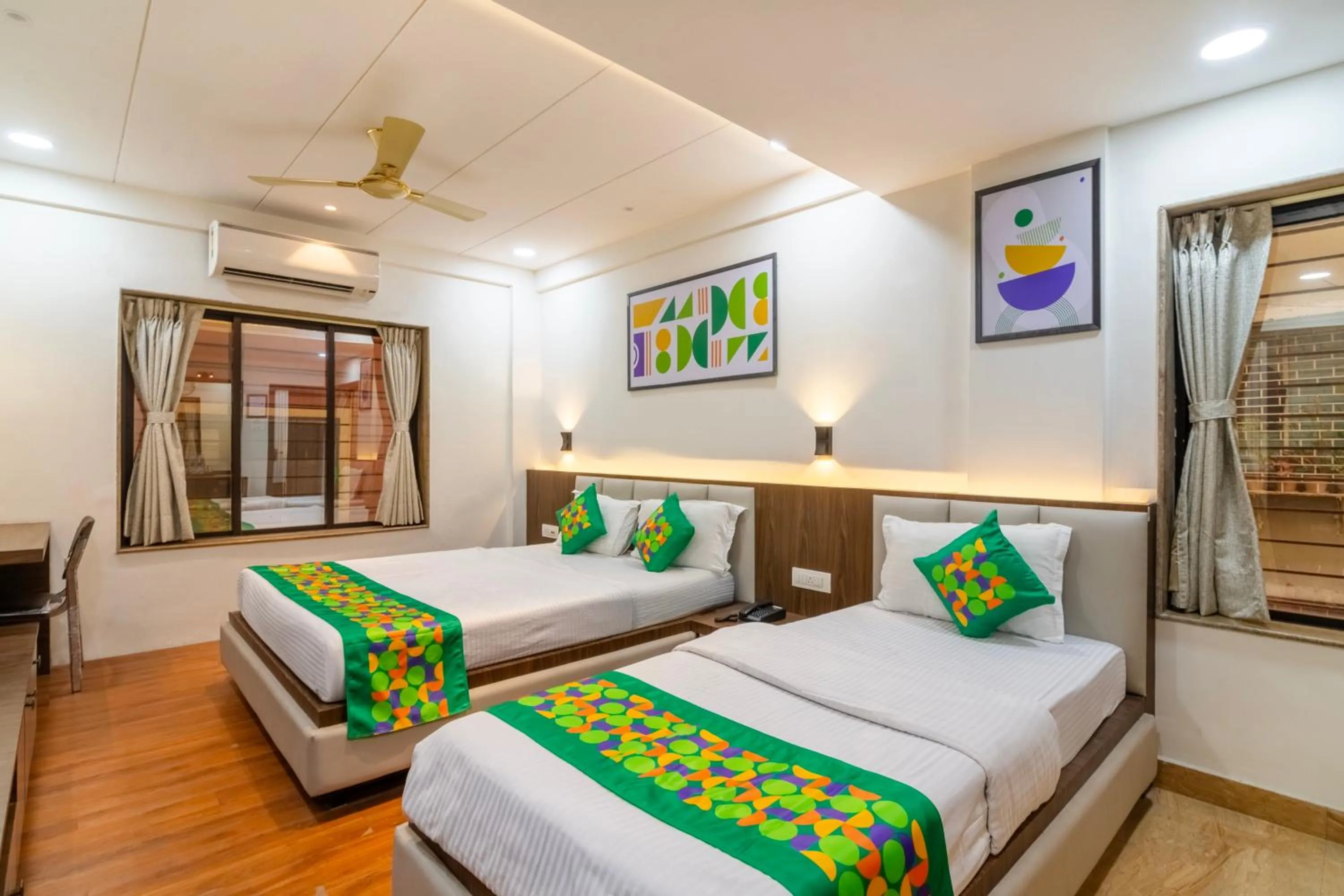 Bedroom, Bed in Treebo Petals Suites & Banquet - New Town