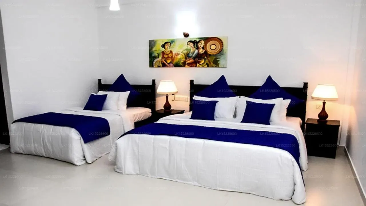 Bed in Blue Spring Hotel Wadduwa