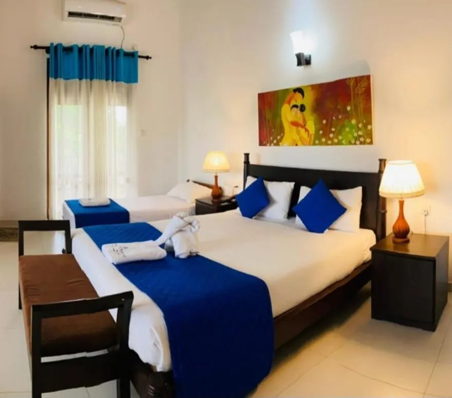Bed in Blue Spring Hotel Wadduwa