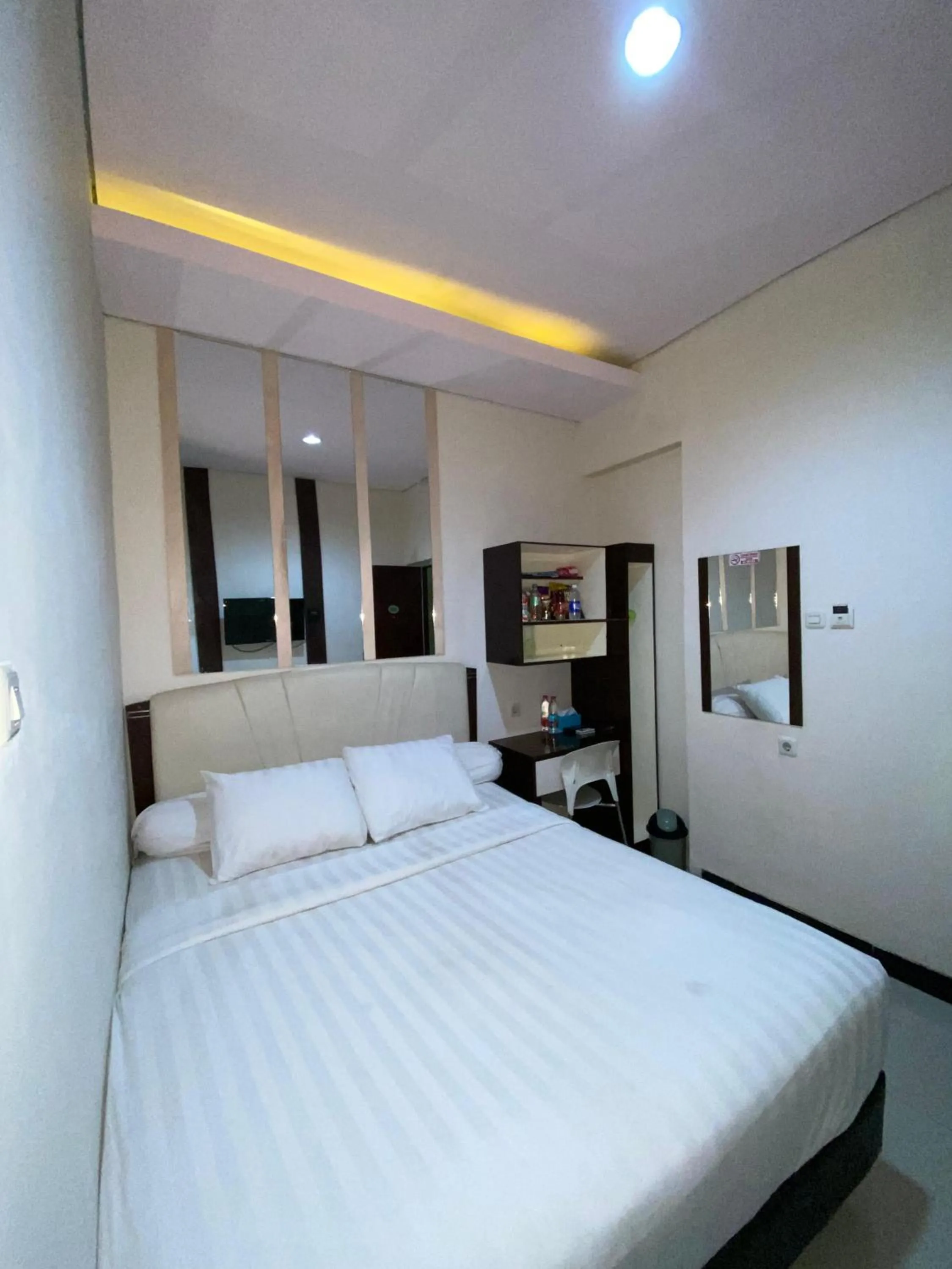 Bed in deKOST Madiun