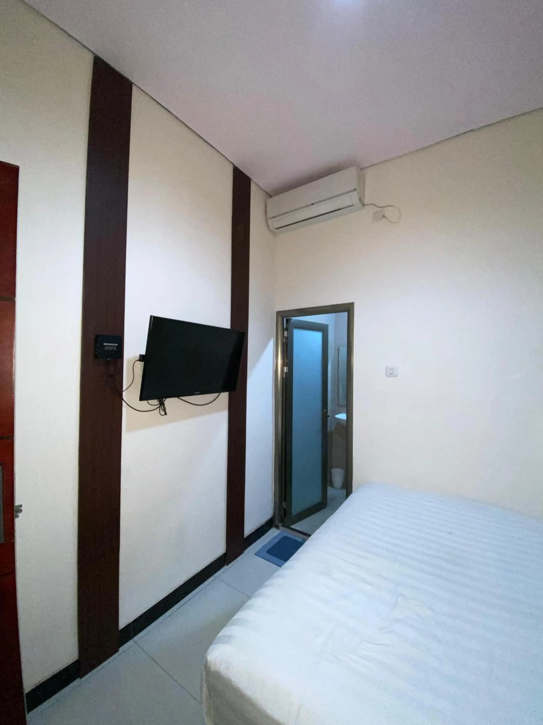 Bed in deKOST Madiun