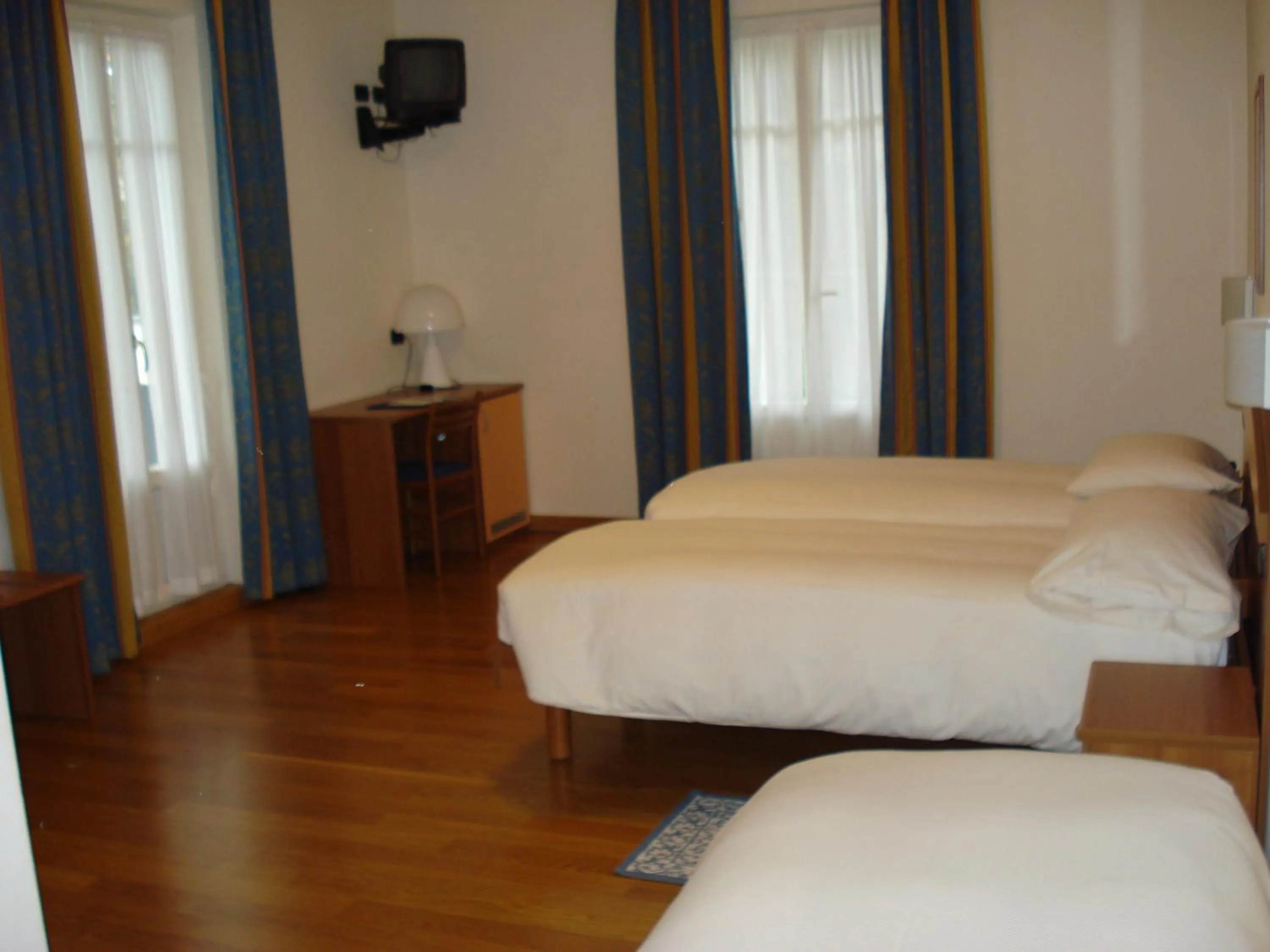 Bed in Hotel Lario