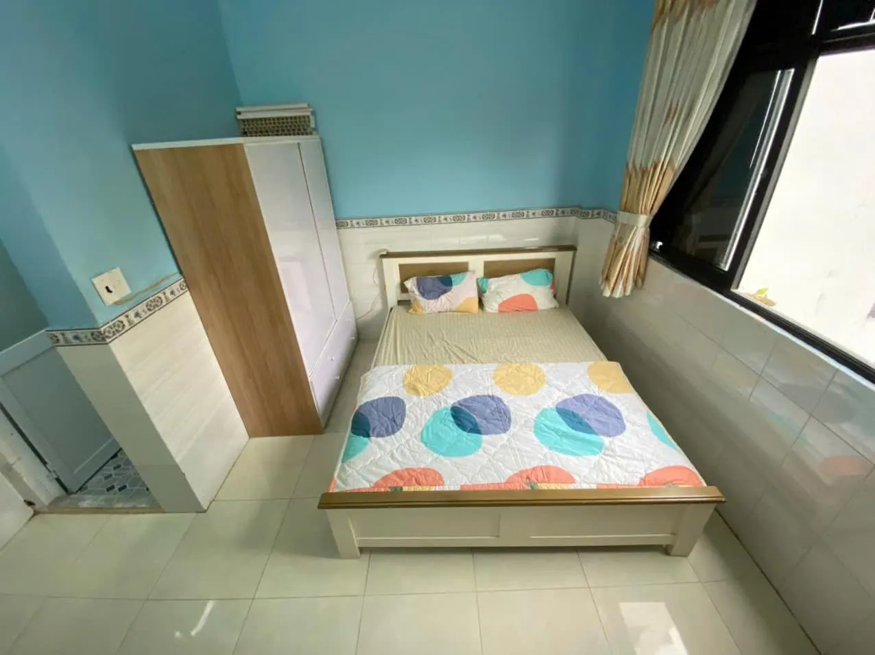 Bed in Sky Center Apartment