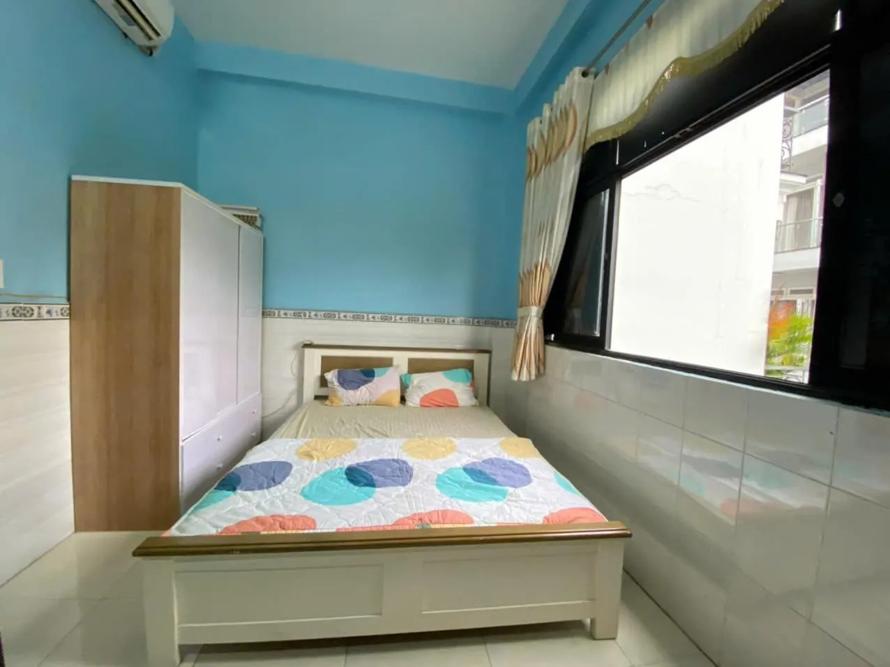 Bed in Sky Center Apartment