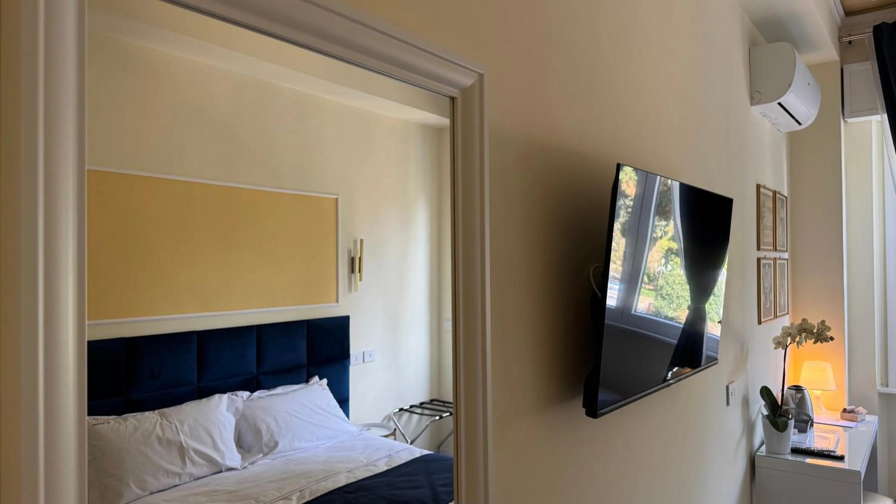 Bed in AC GOLD B&B Boutique Rooms & Suite