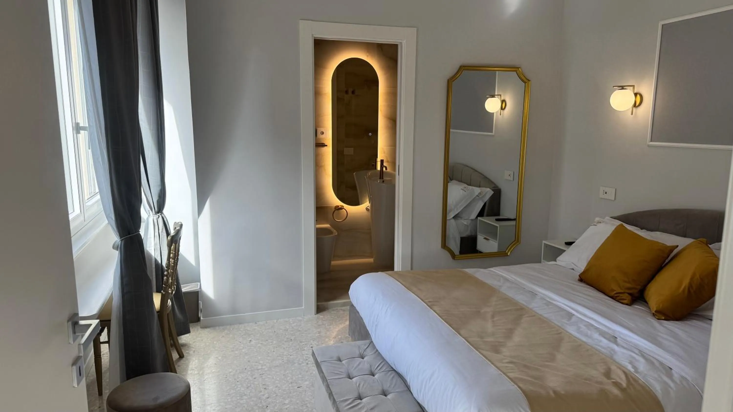 Bed in AC GOLD B&B Boutique Rooms & Suite