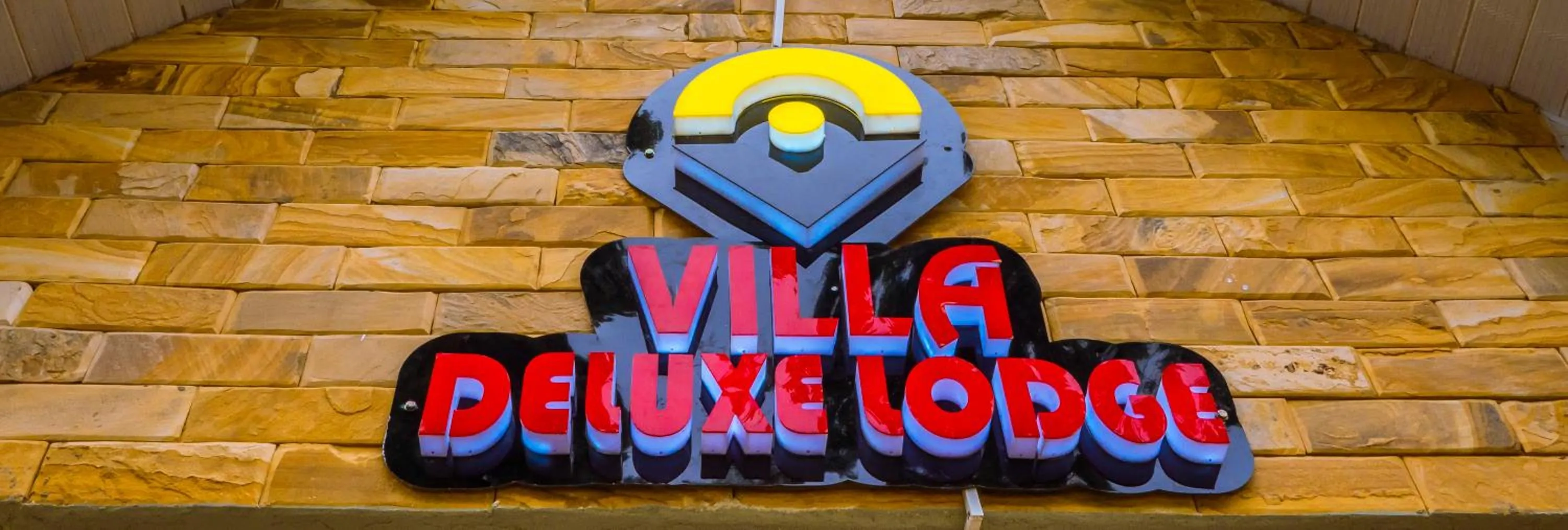 Property logo or sign in Villa Deluxe Lodge