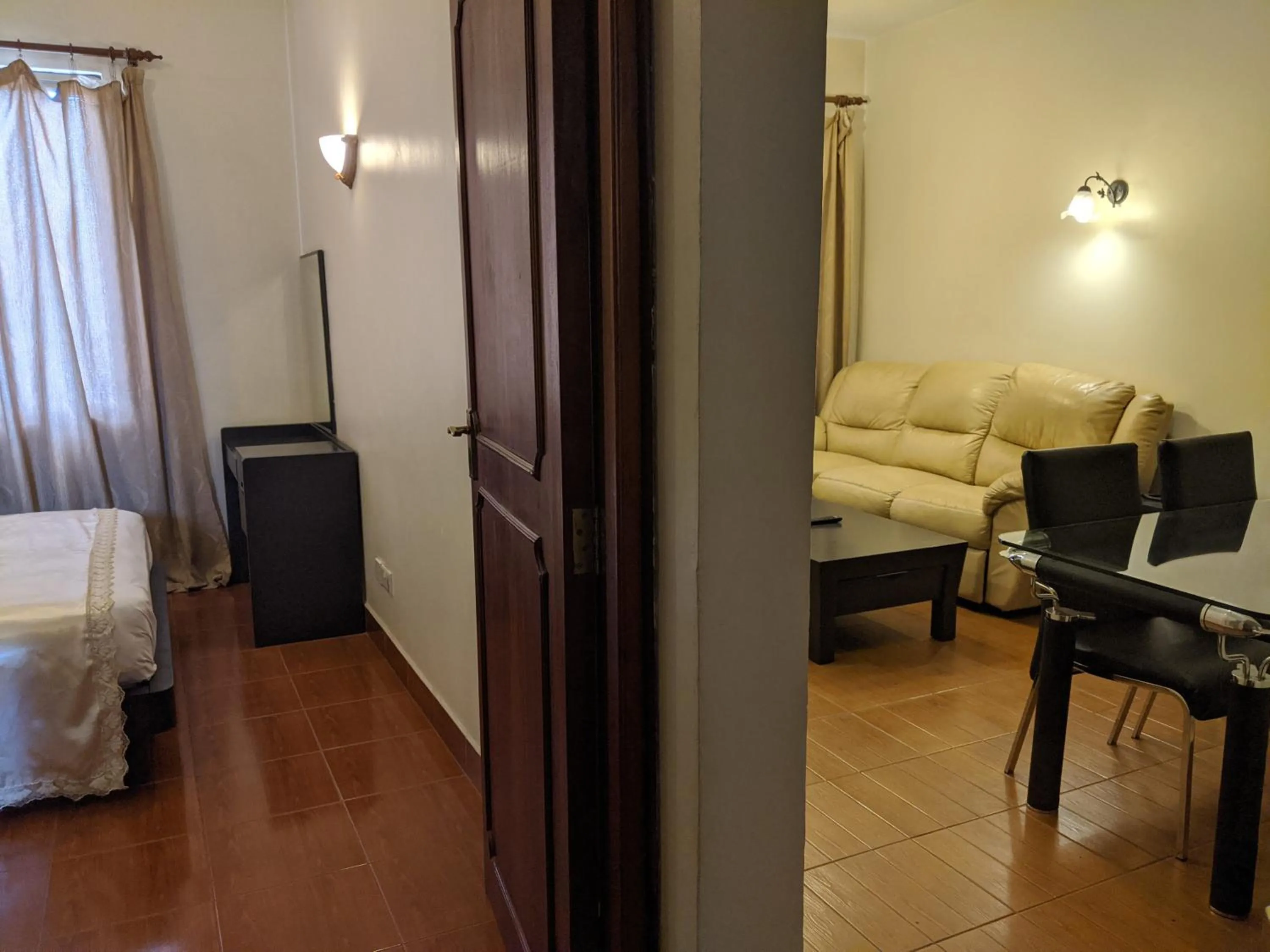 Photo of the whole room, Bed in Prestige Hotel Suites