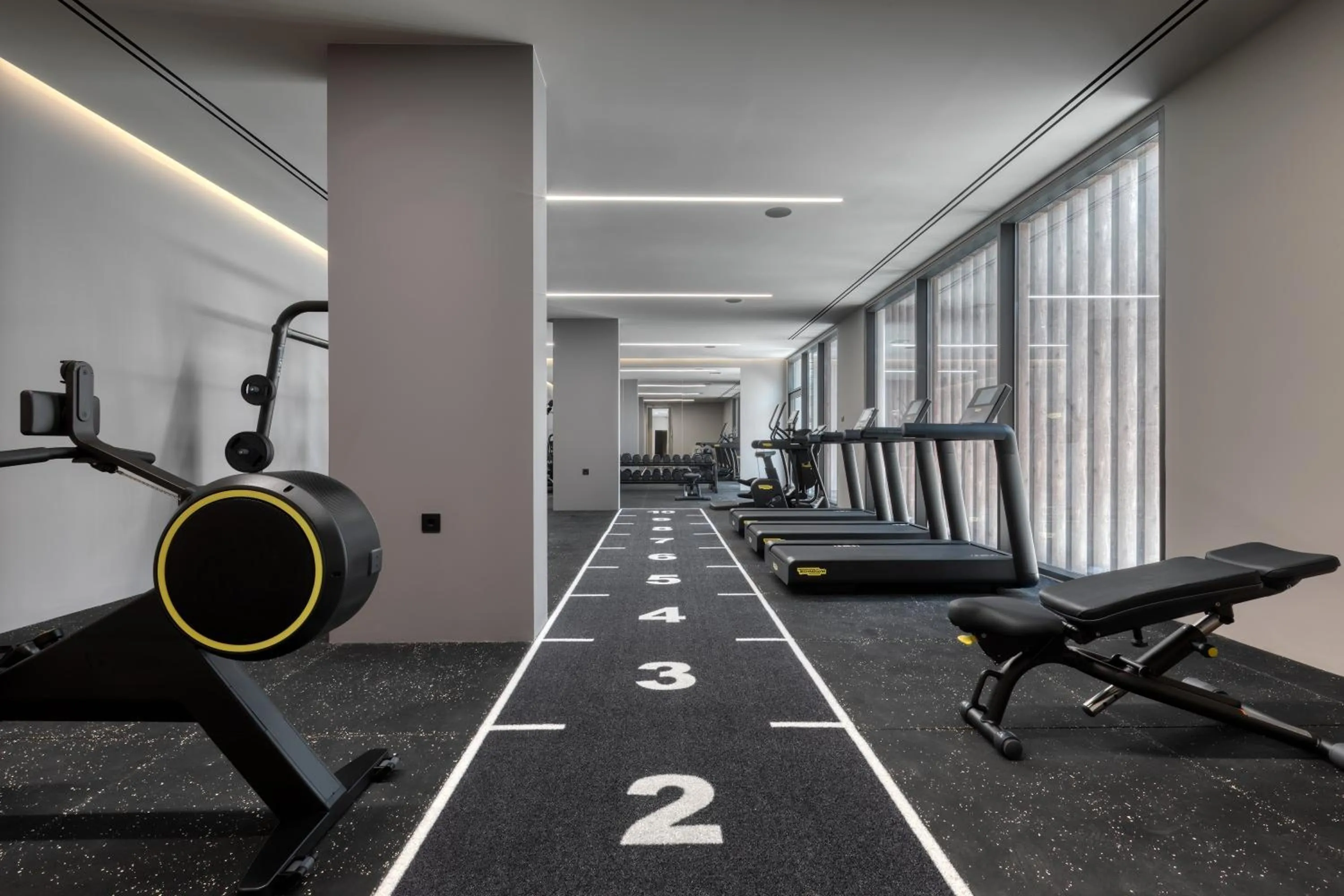 Fitness centre/facilities in Mosay All Suite Hotel