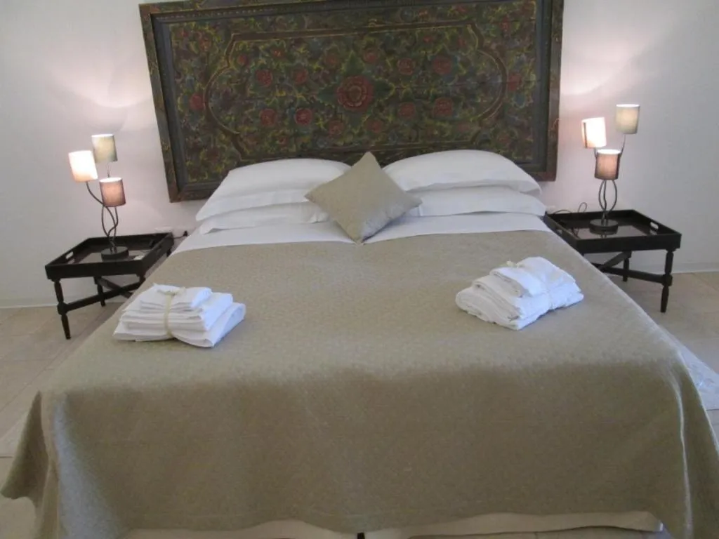 Photo of the whole room, Bed in Masseria Palane