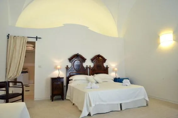 Photo of the whole room, Bed in Masseria Palane